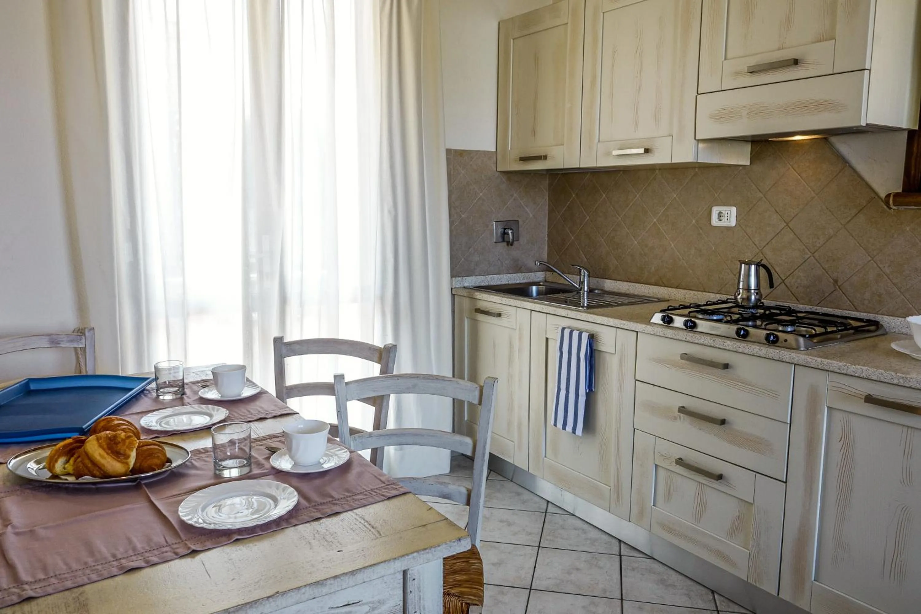 Kitchen or kitchenette in Villetta Tina