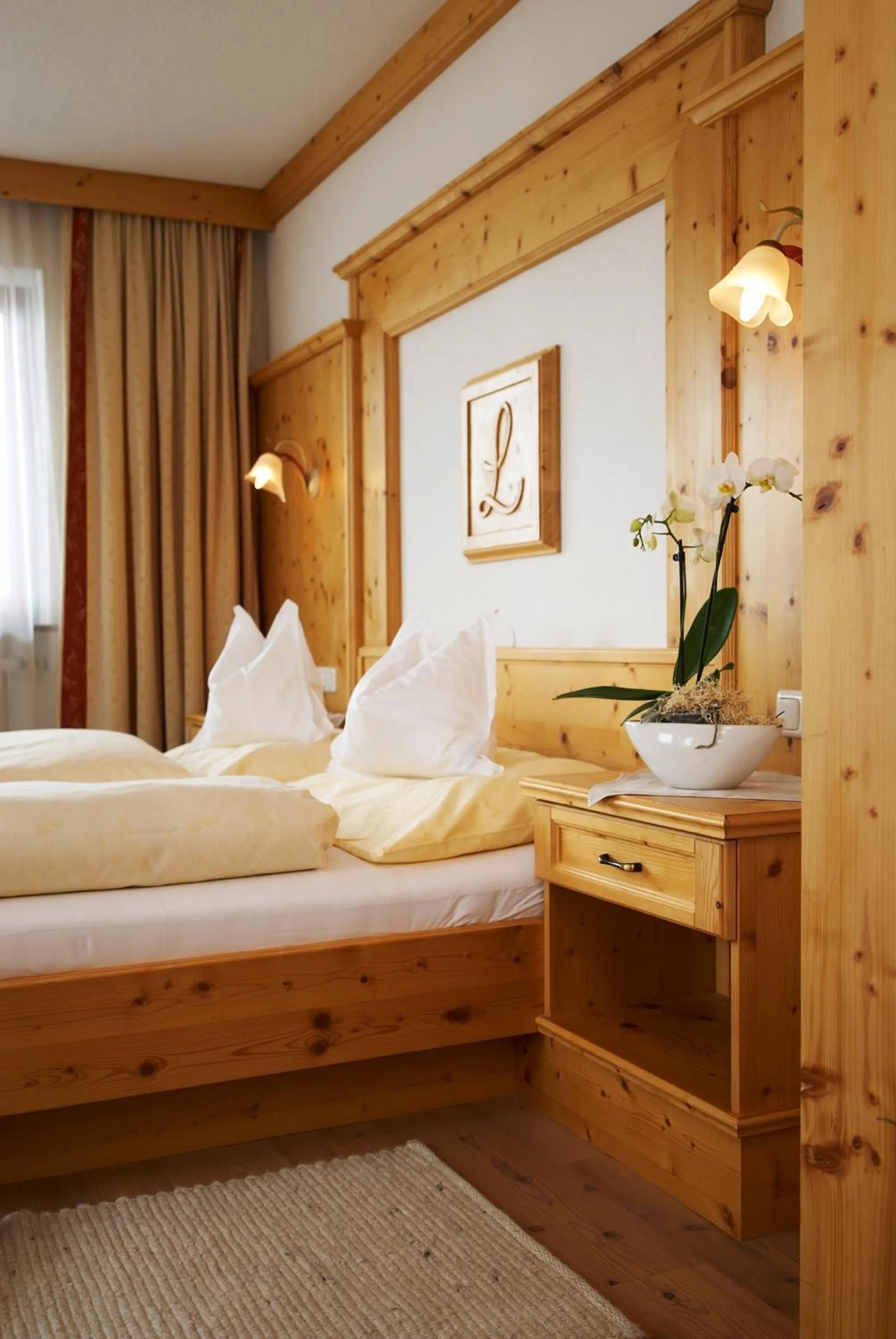 Bed in Alpenhotel Laurin