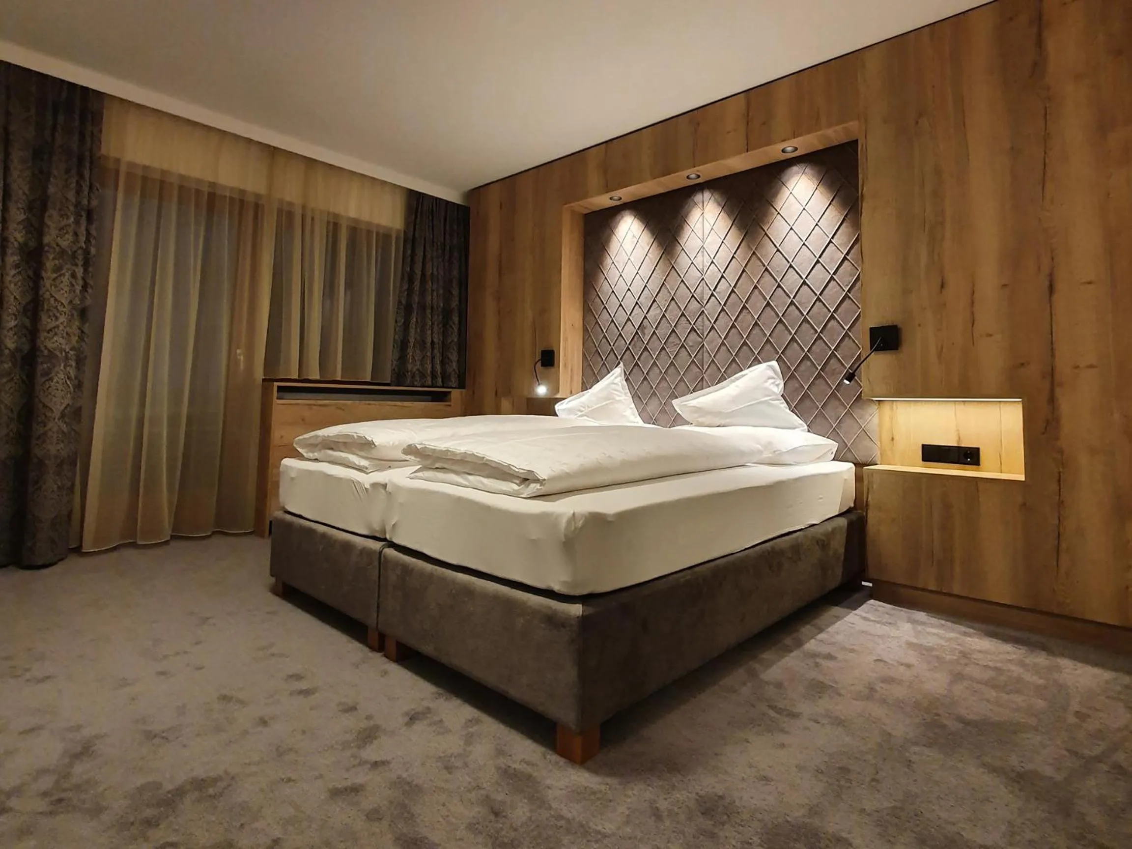 Photo of the whole room, Bed in Alpenhotel Laurin