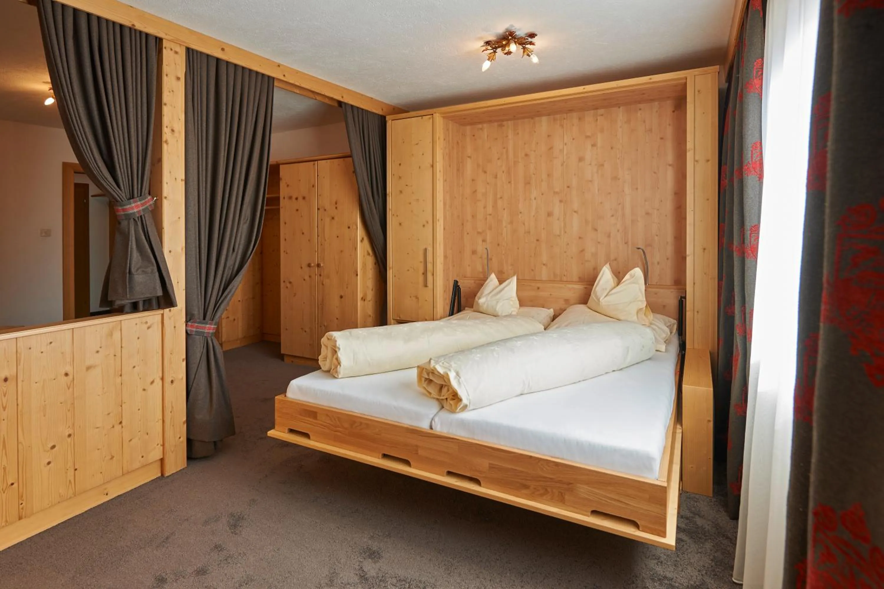 Bed in Alpenhotel Laurin