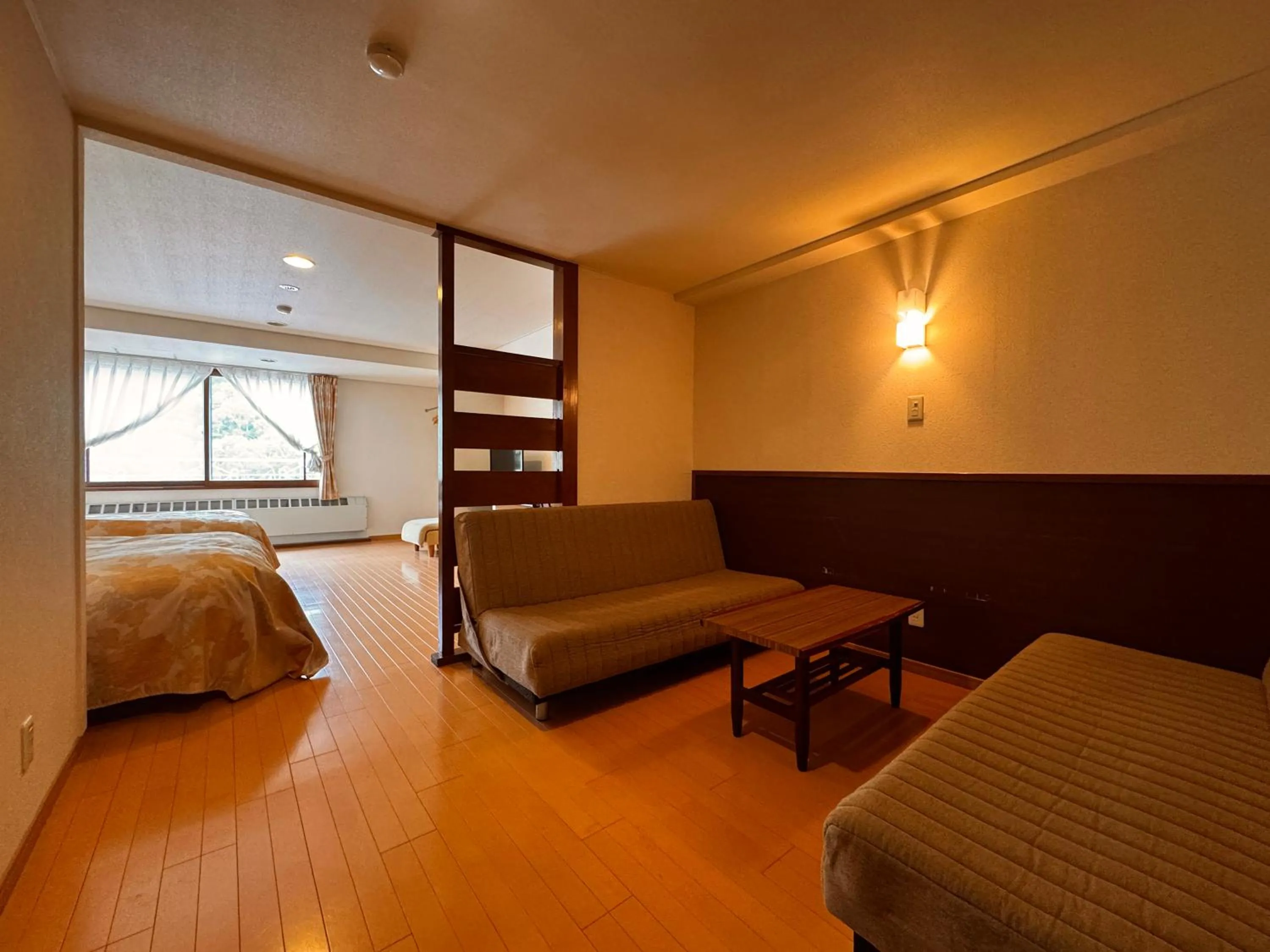 Bed in Kidoike Onsen Hotel