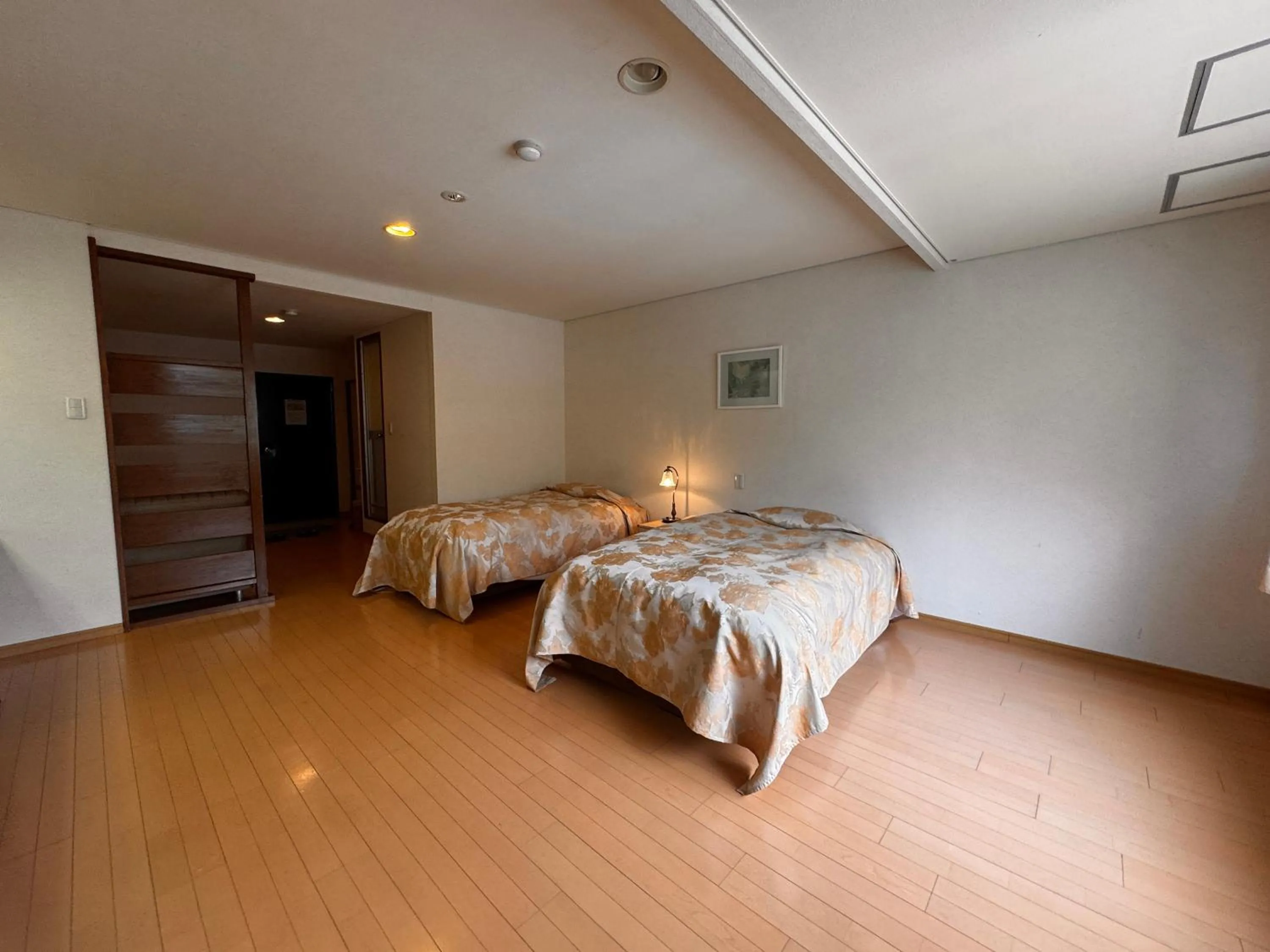 Bed in Kidoike Onsen Hotel