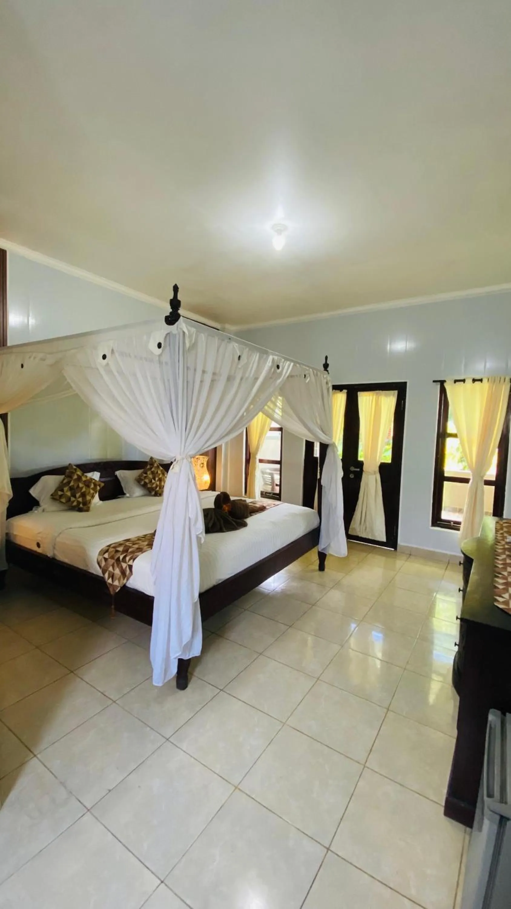Bed in Balangan Sea View Bungalow