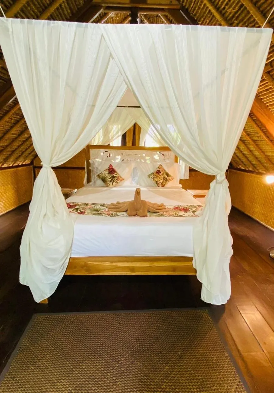 Bed in Balangan Sea View Bungalow