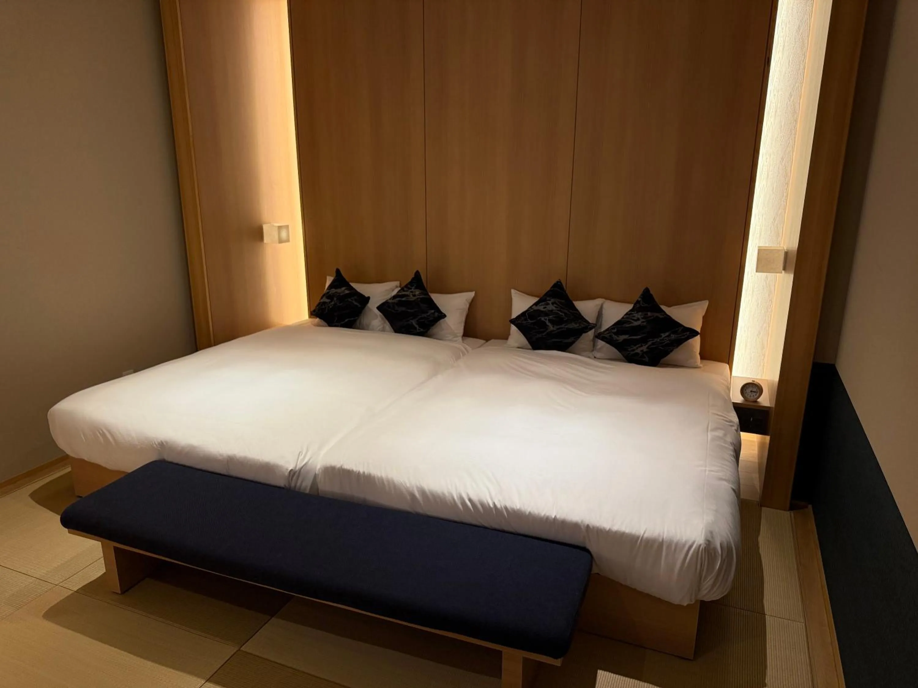 Bed in FIRSTCABIN Kyoto Nijojo