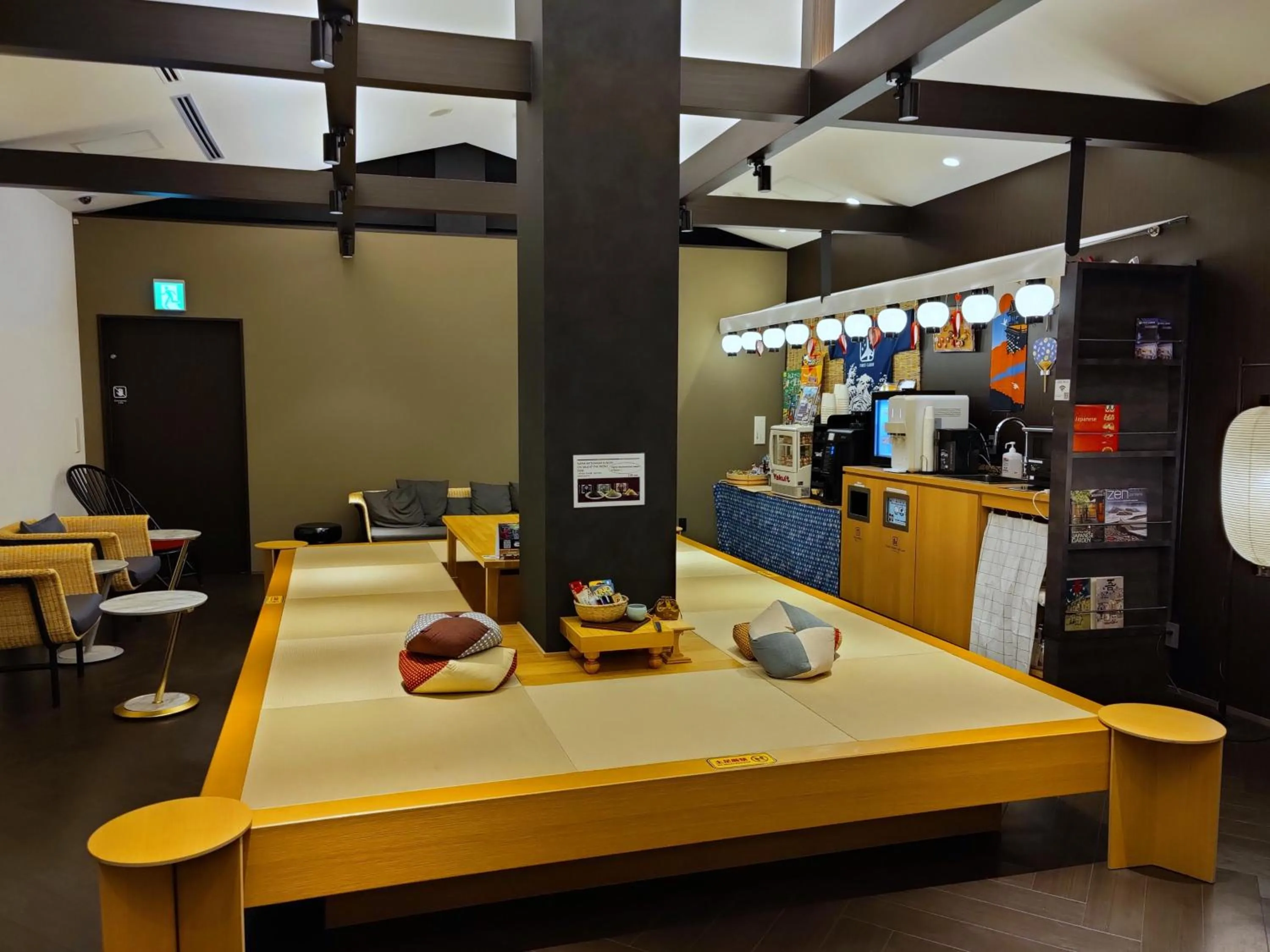 Communal lounge/ TV room in FIRSTCABIN Kyoto Nijojo