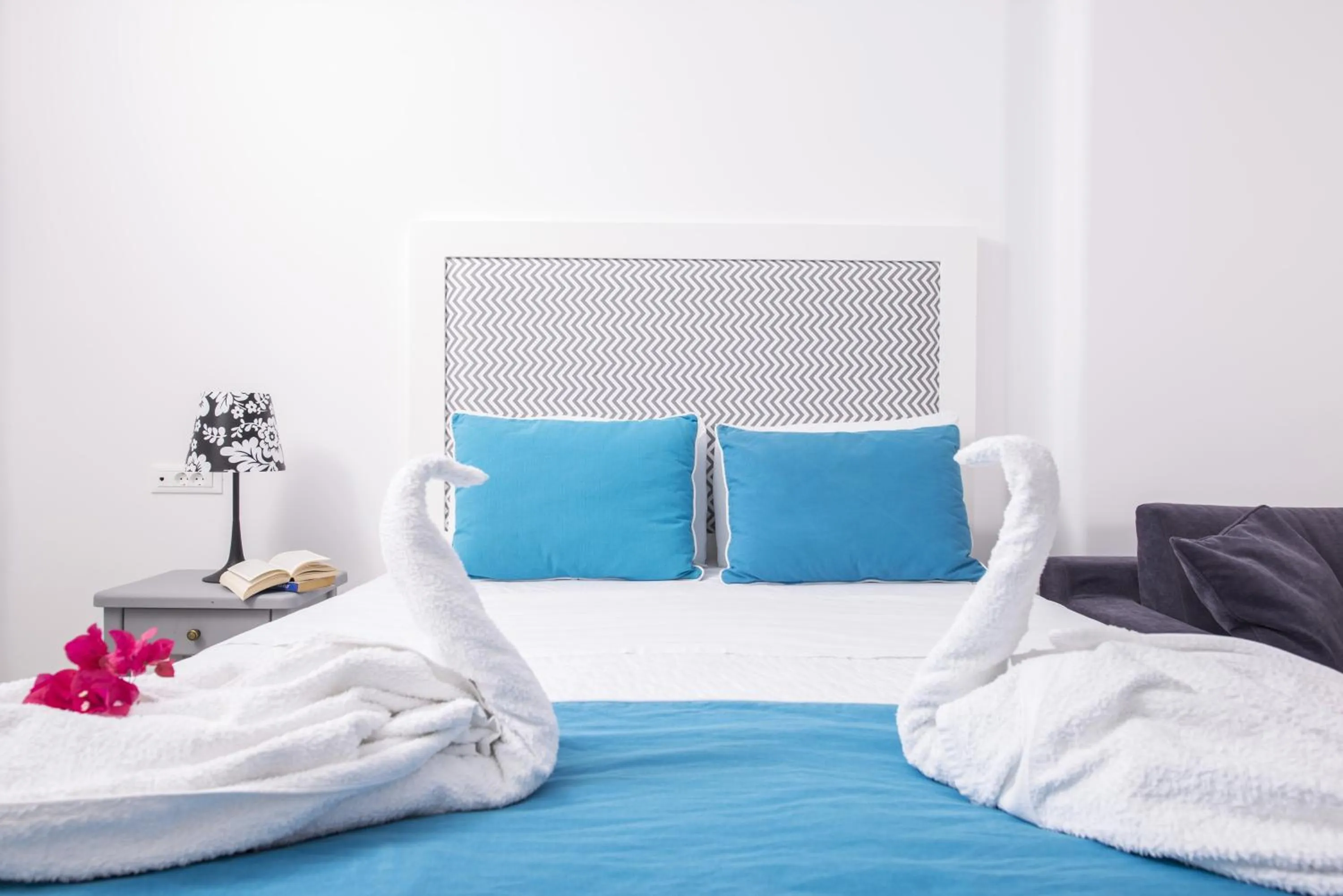 Bed in Blue Waves Suites & Apartments