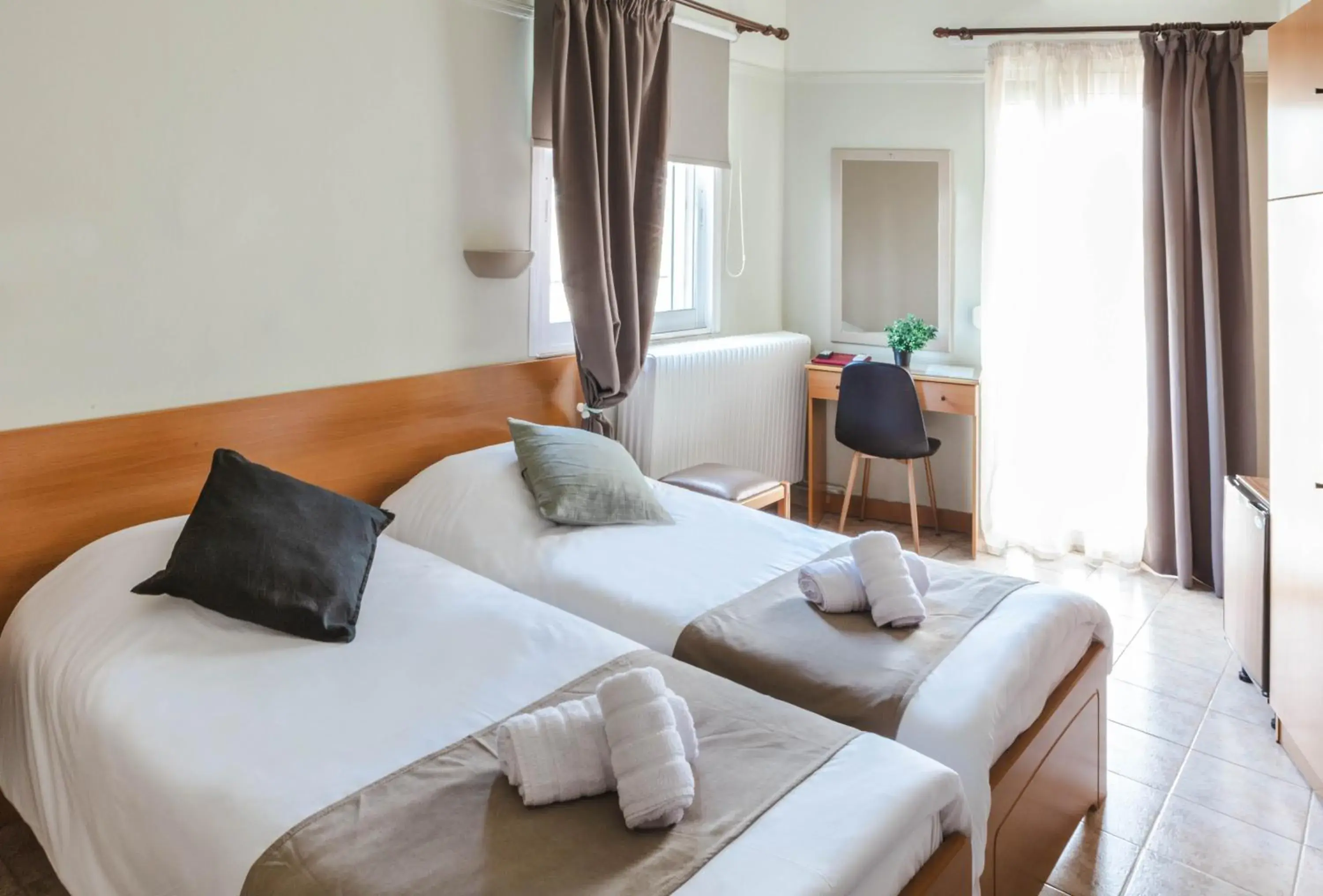 Bed in Anesis Hotel Bed in Anesis Hotel