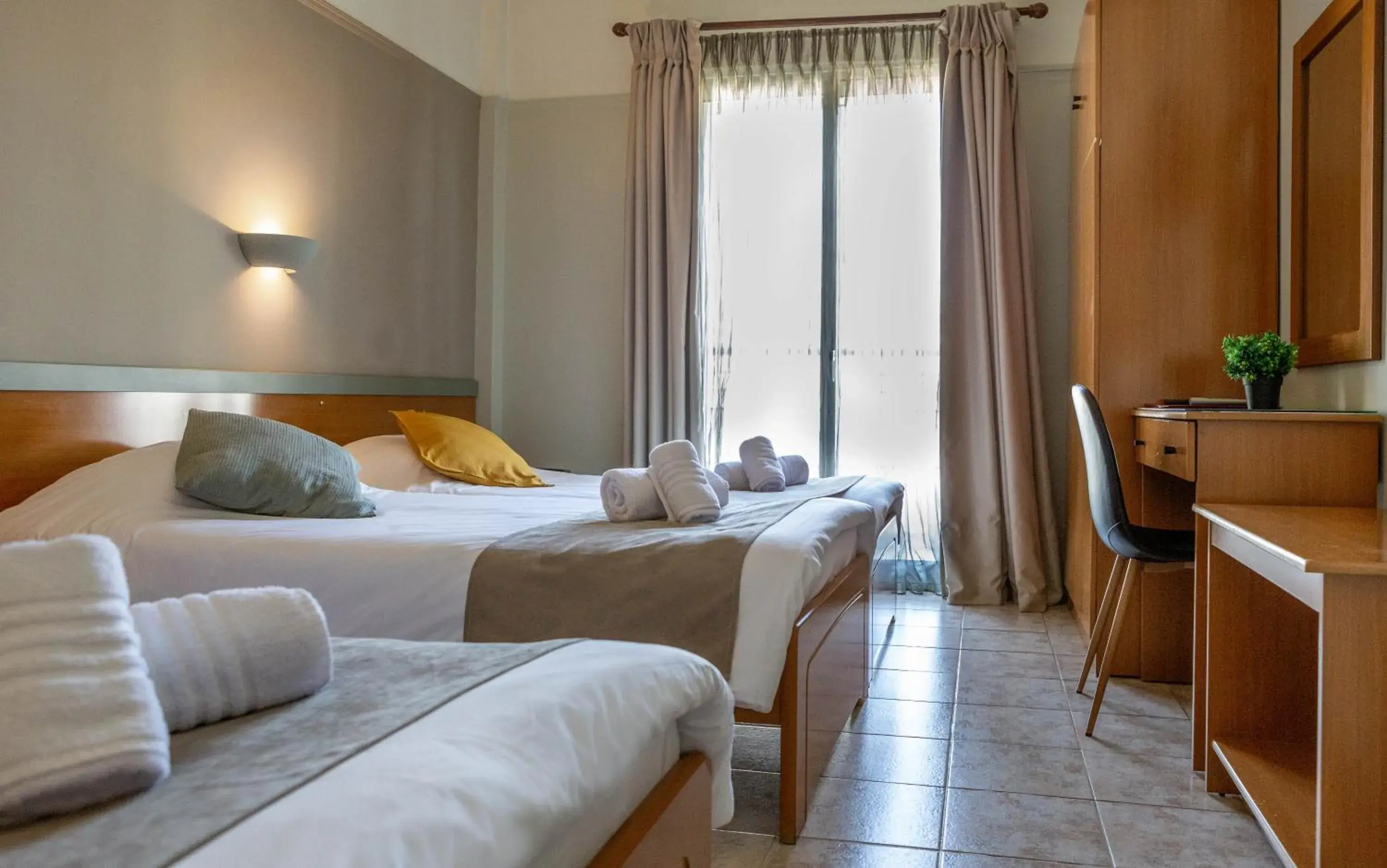 Bed in Anesis Hotel Bed in Anesis Hotel