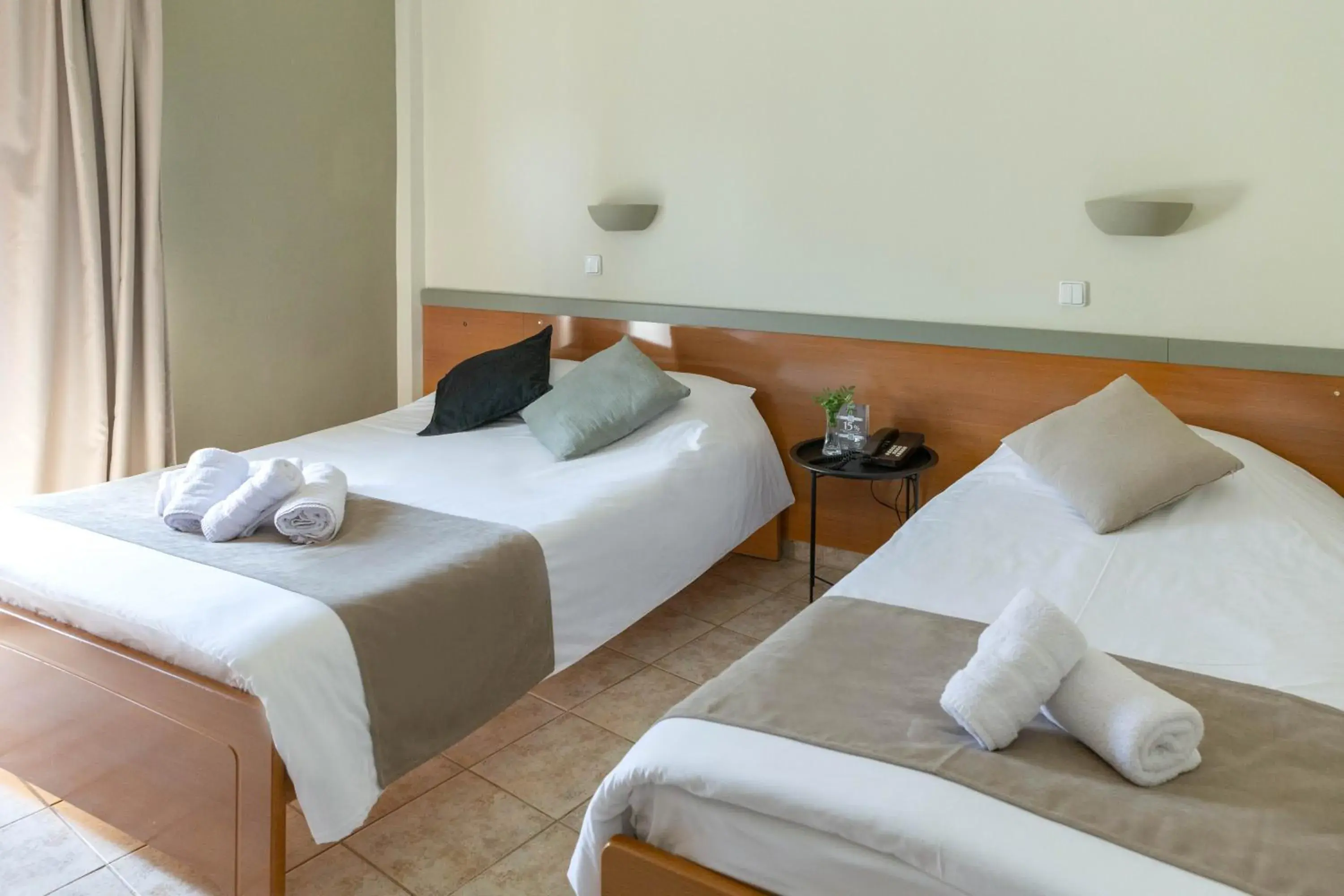 Bed in Anesis Hotel Bed in Anesis Hotel