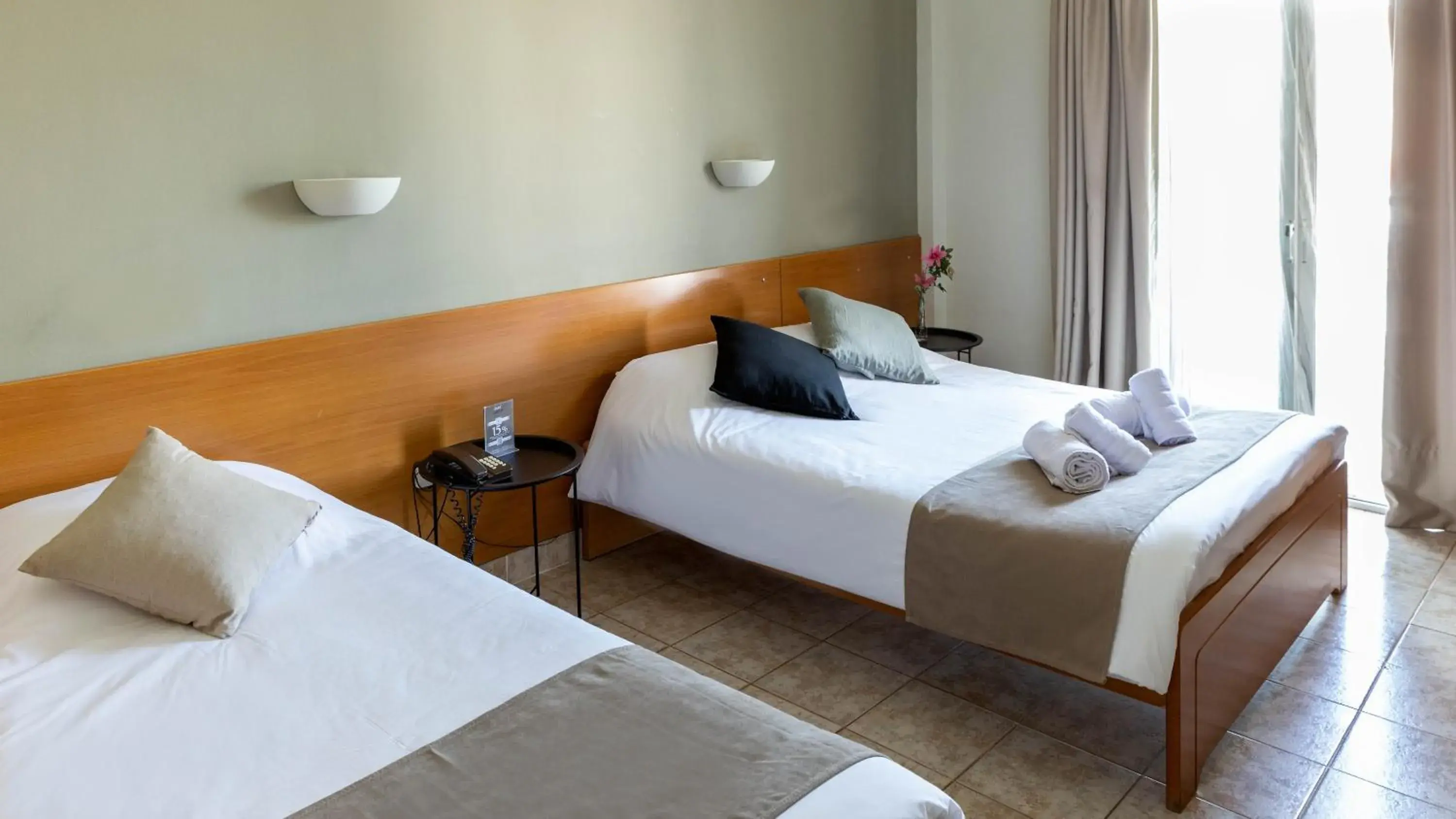 Bed in Anesis Hotel Bed in Anesis Hotel