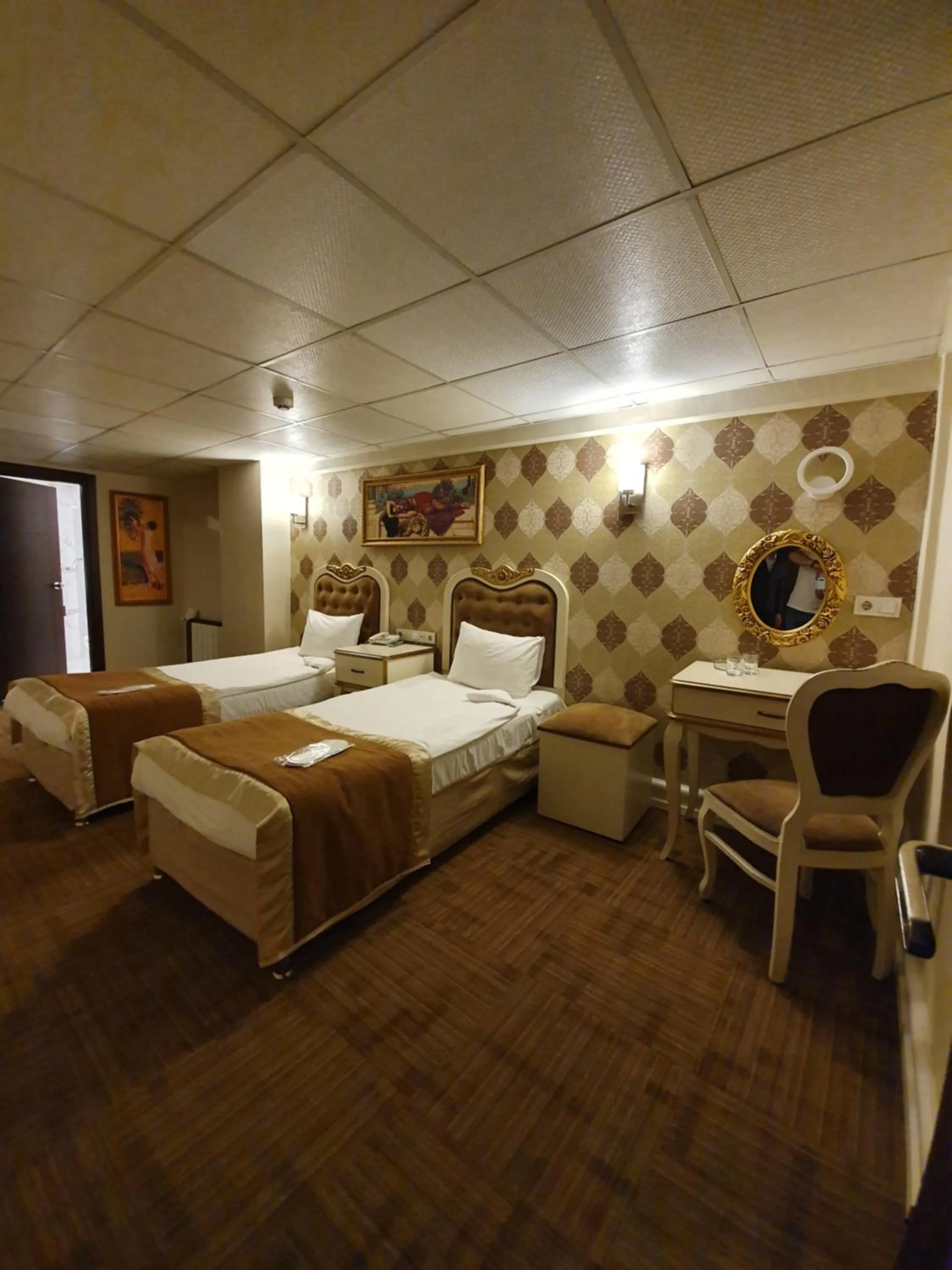 Bed in Elysion Hotel