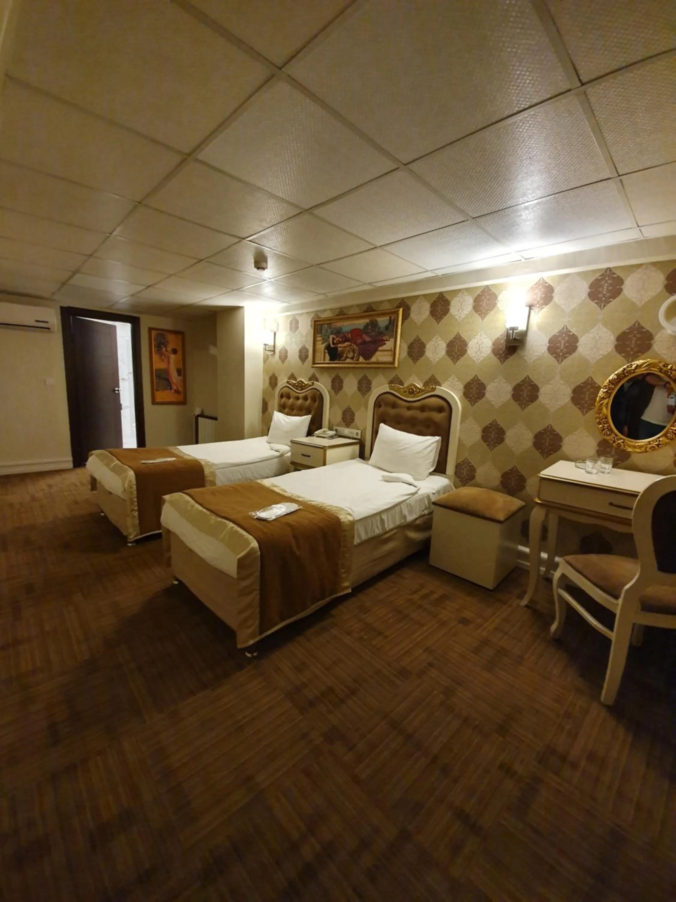 Bed in Elysion Hotel