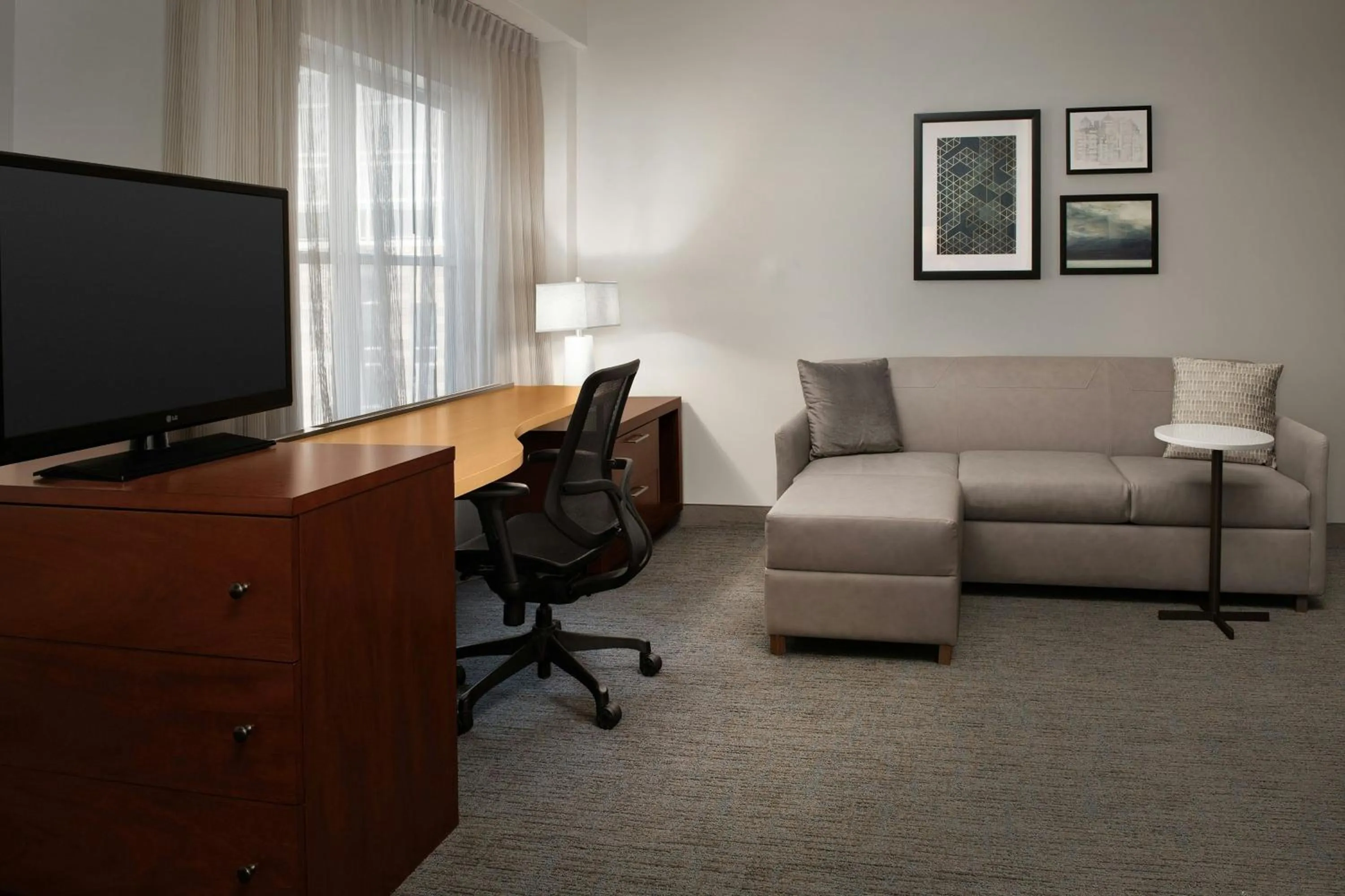 Living room in Residence Inn by Marriott Syracuse Downtown at Armory Square
