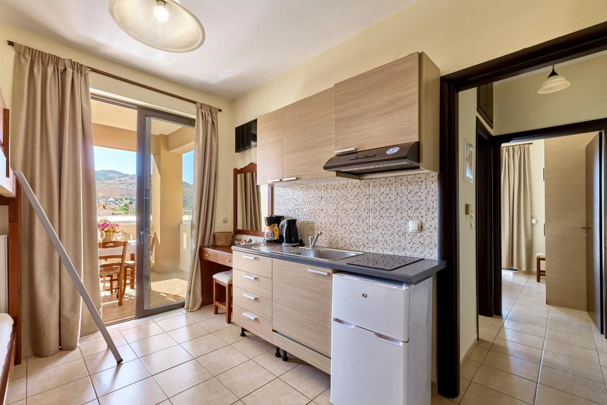 Kitchen or kitchenette in Villa Gereoudis SeaView Apartments-Pool & Bar