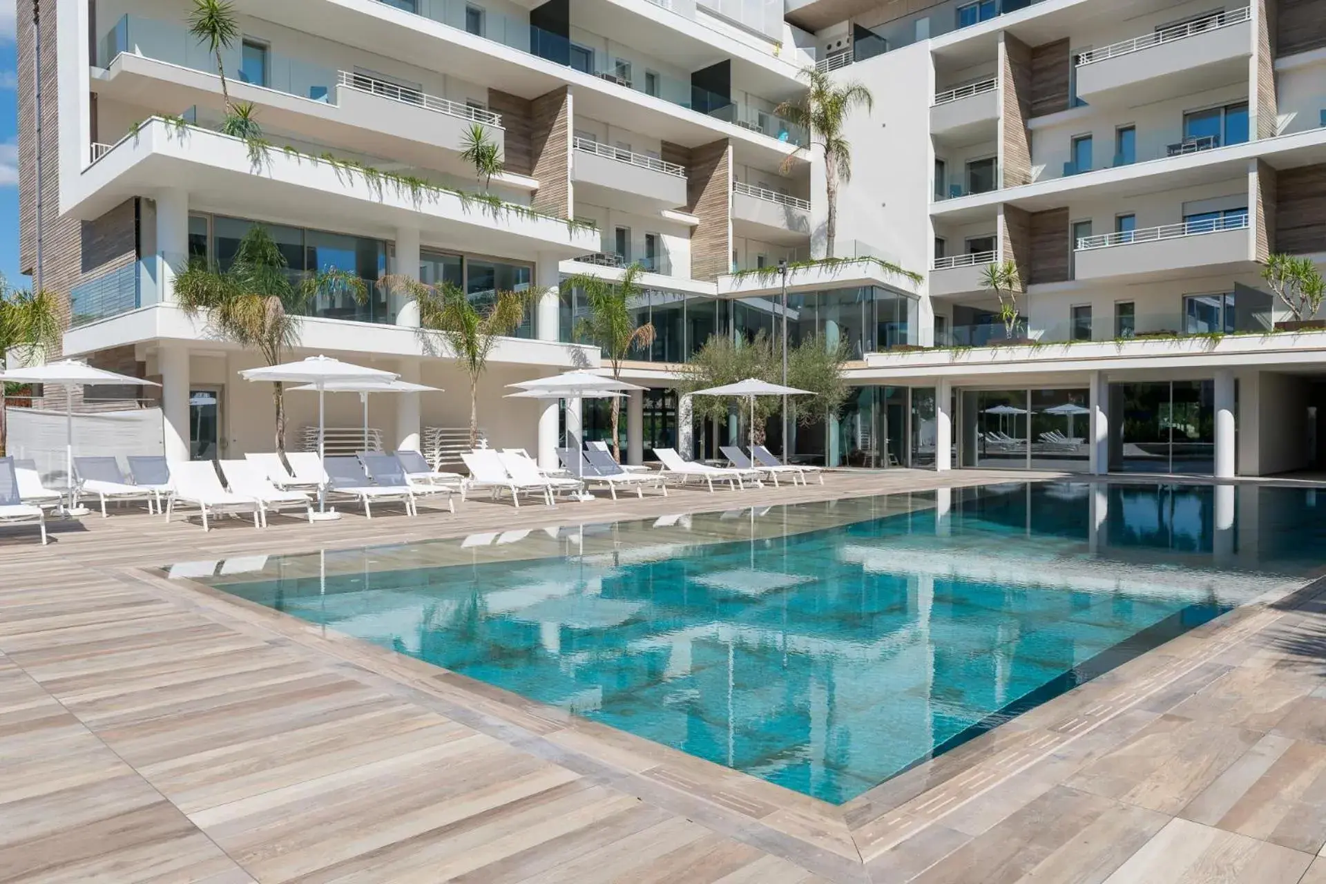 Swimming pool in YOUMAMI Suite Hotel Wellness&Spa Swimming pool in YOUMAMI Suite Hotel Wellness&Spa