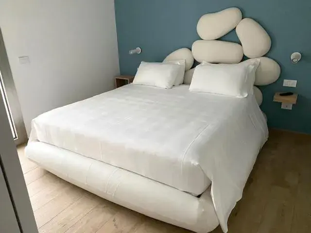 Bed in YOUMAMI Suite Hotel Wellness&Spa Bed in YOUMAMI Suite Hotel Wellness&Spa