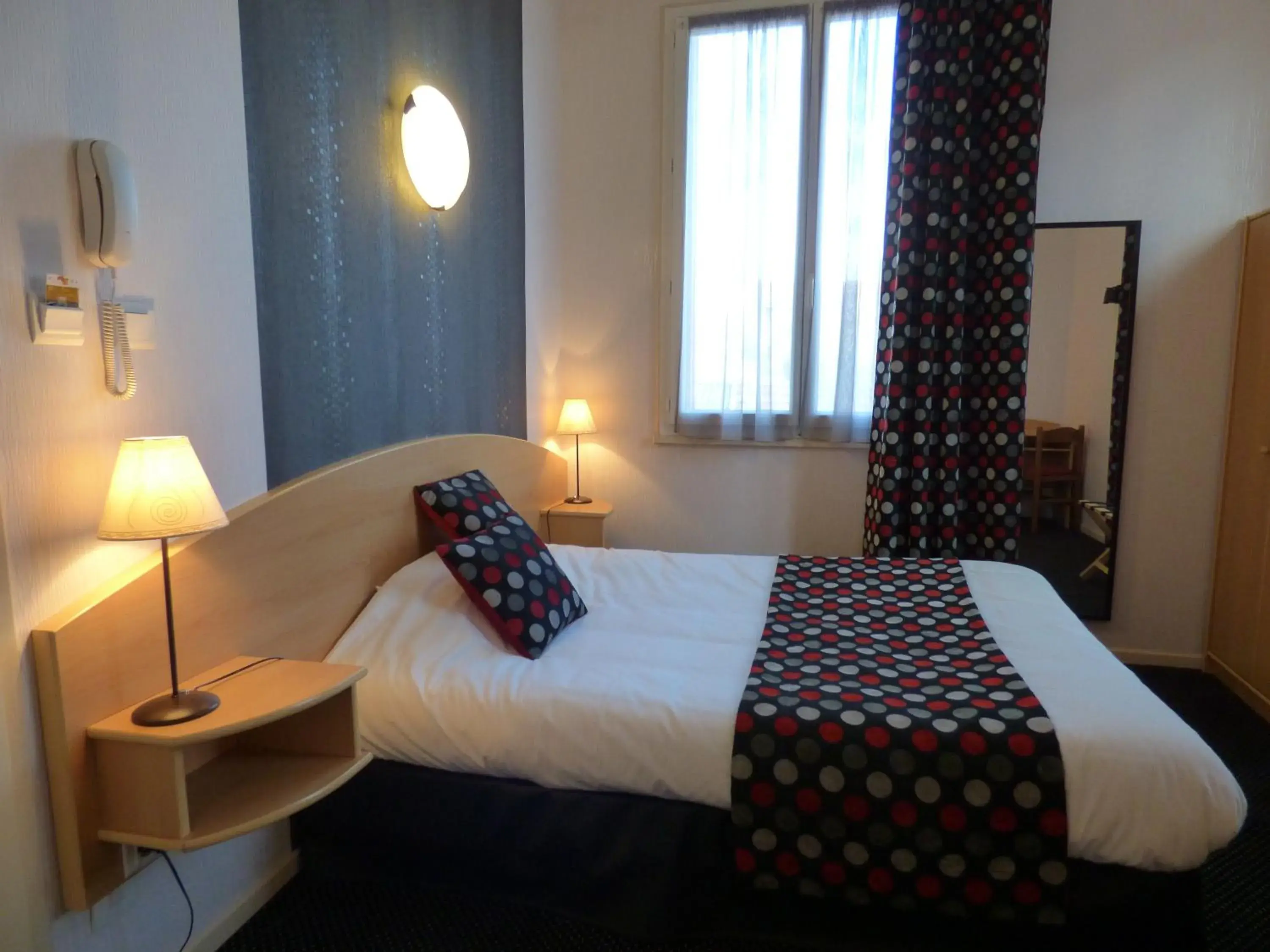 Bed in Cit'Hotel de La Vallée Bed in Cit'Hotel de La Vallée