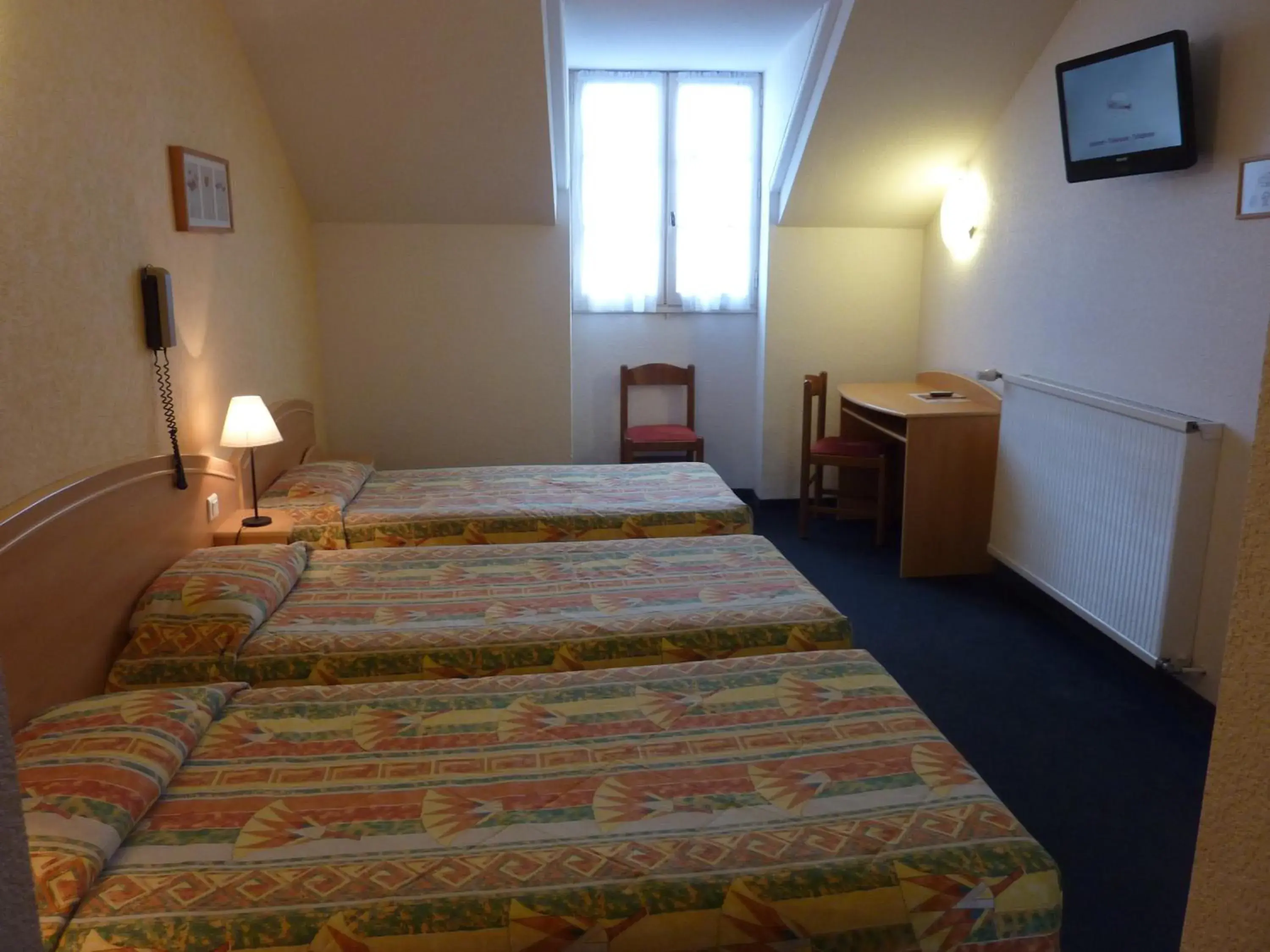 Bed in Cit'Hotel de La Vallée Bed in Cit'Hotel de La Vallée