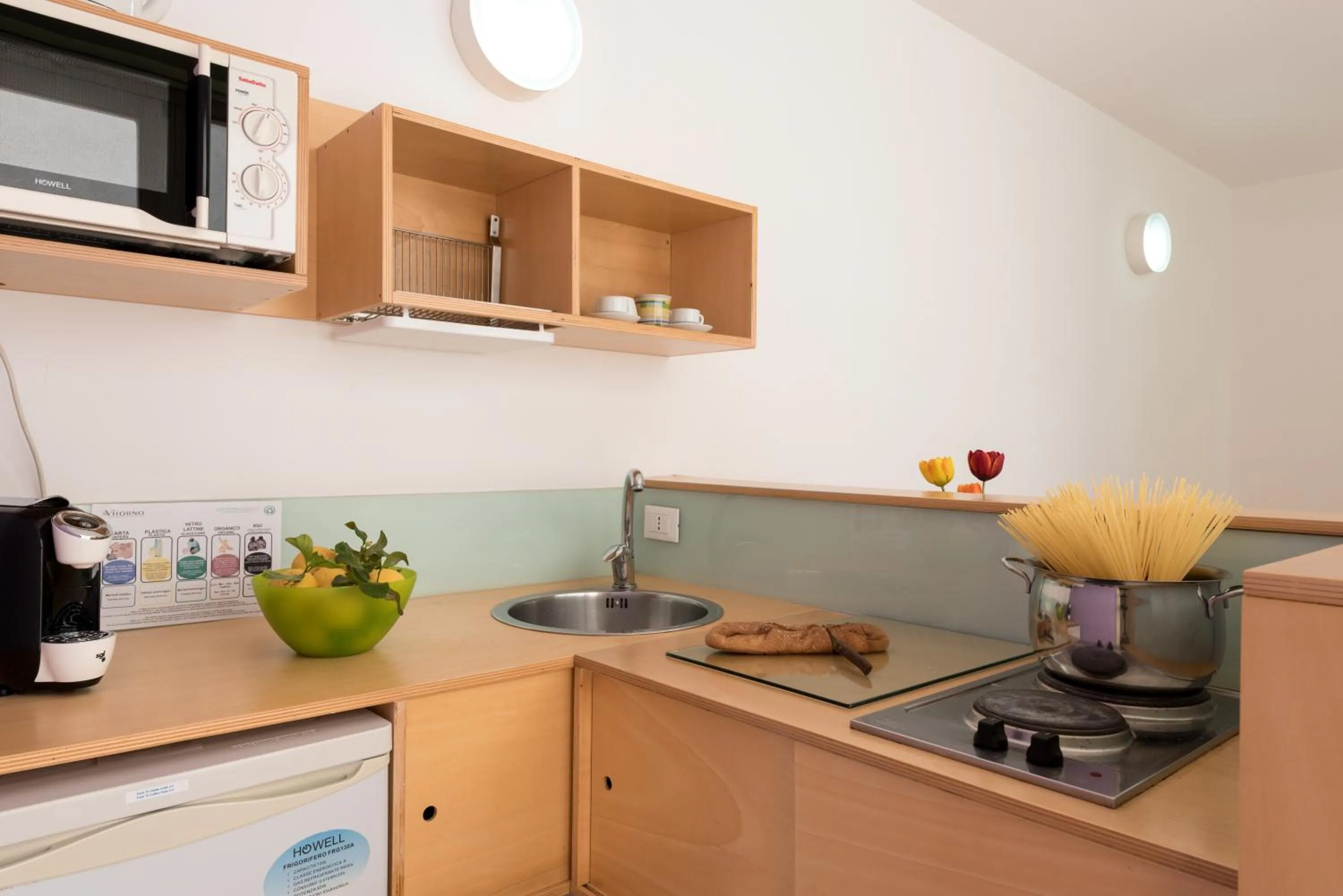 Kitchen or kitchenette in Vitorno Residence