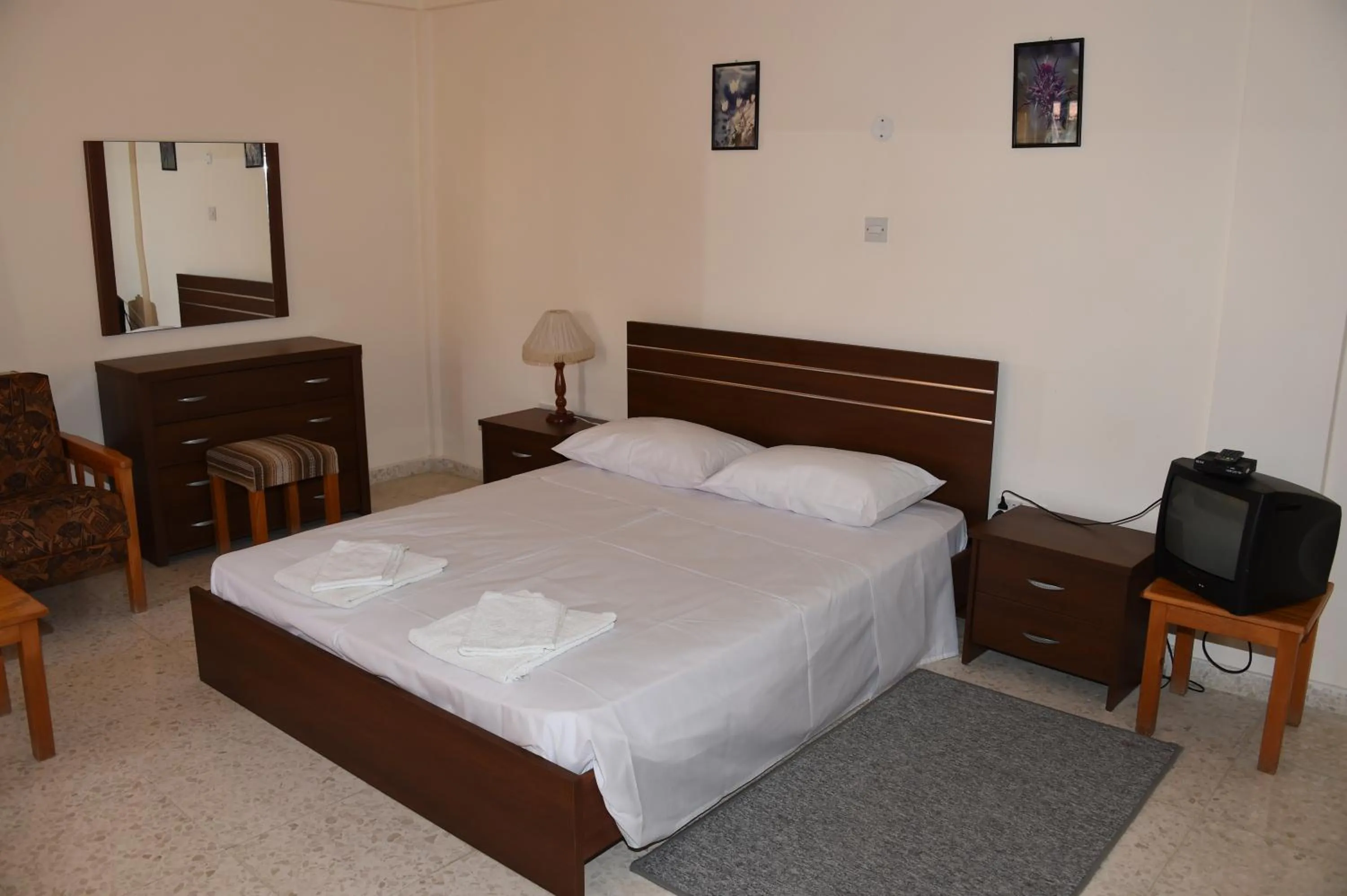 Bedroom in Odysseas & Eleni Hotel Apartments