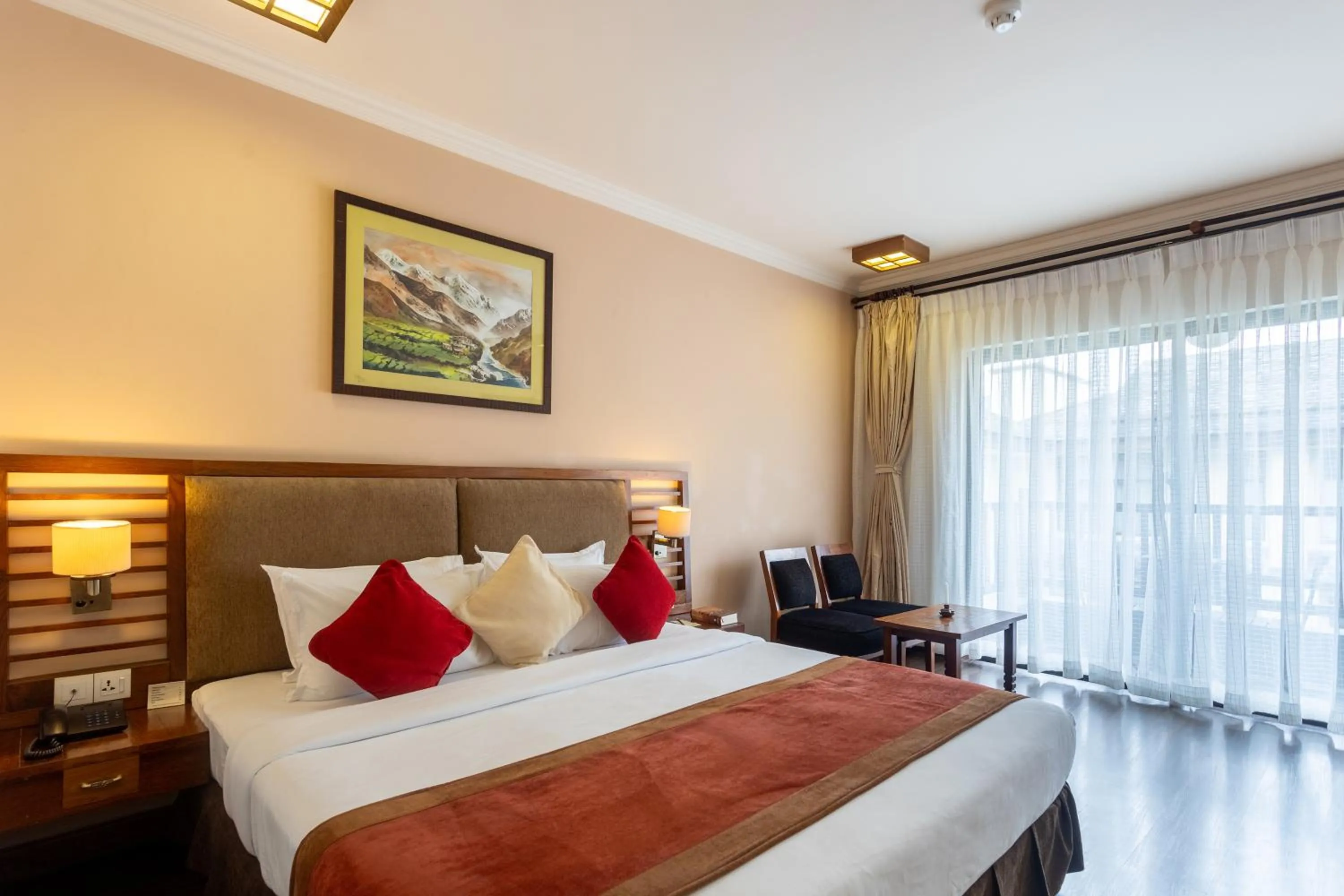 Bed in Atithi Resort & Spa