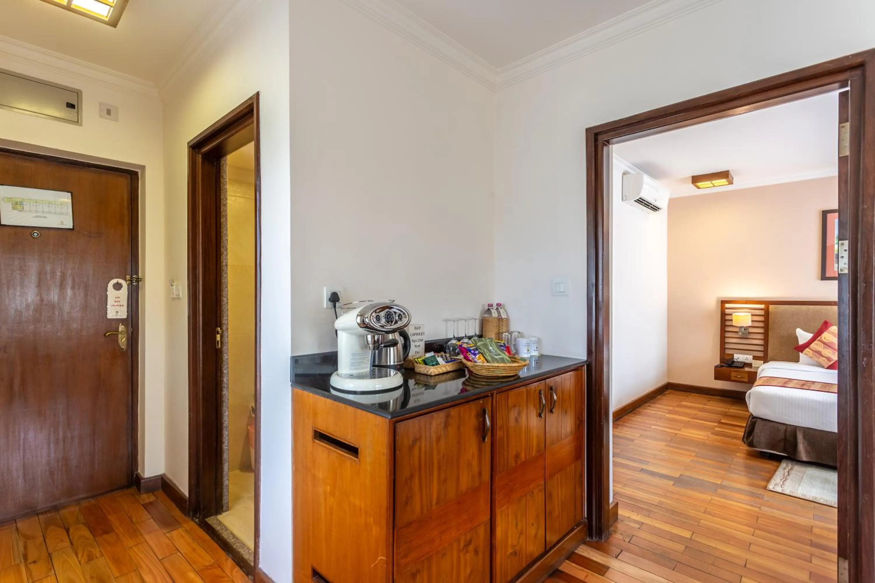 Coffee/tea facilities, Bed in Atithi Resort & Spa