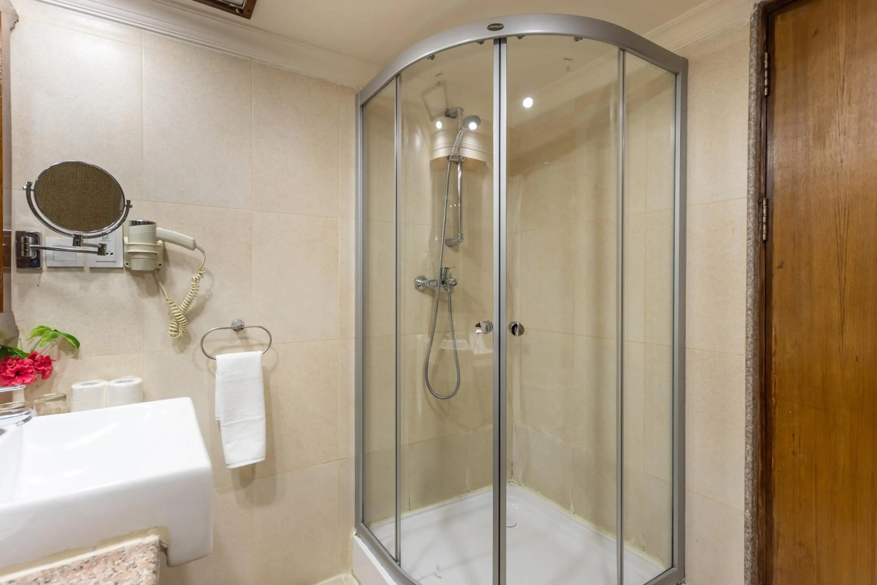 Shower in Atithi Resort & Spa