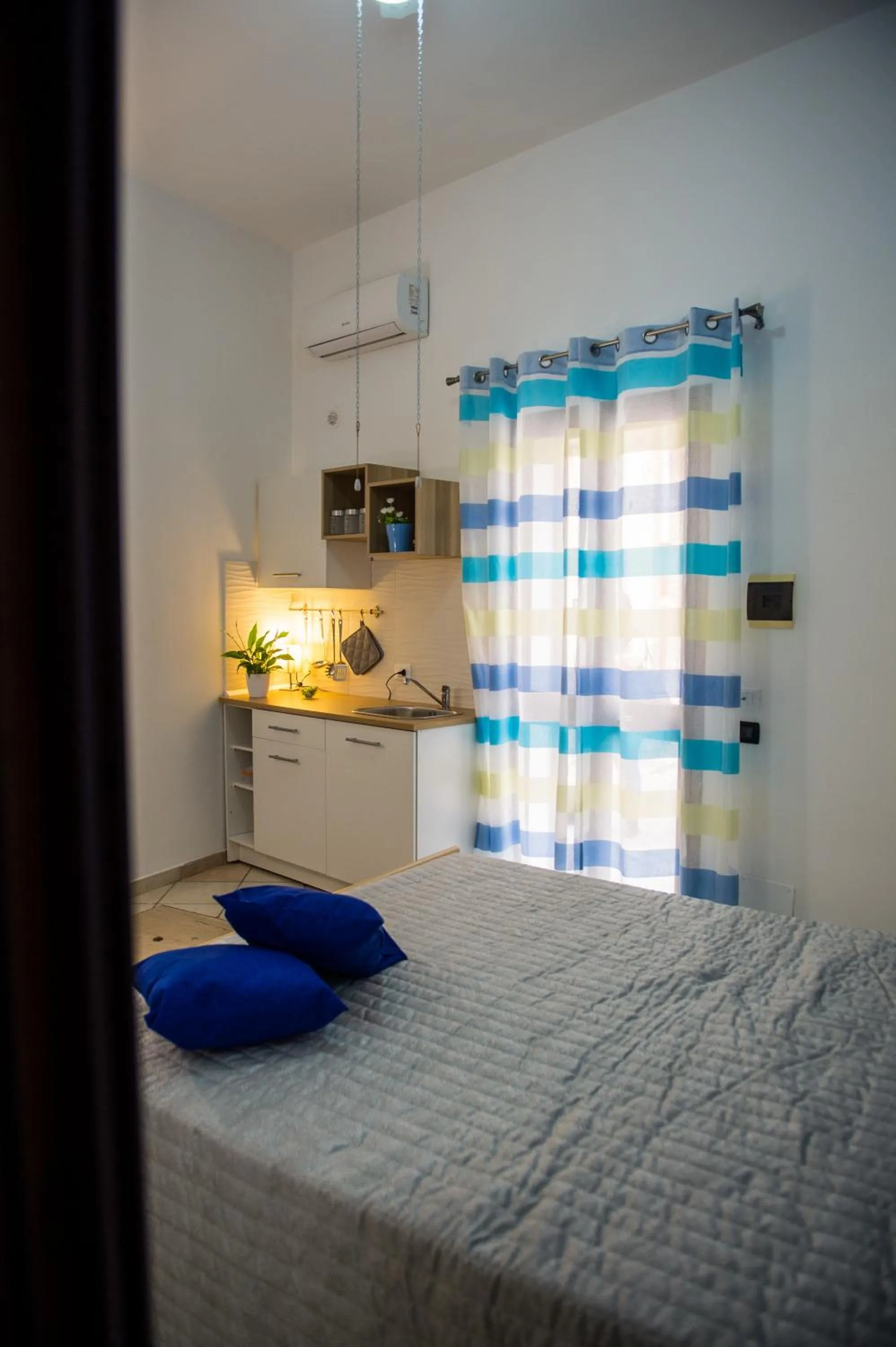 Bed in 'A Cumerdia - Casa Vacanze