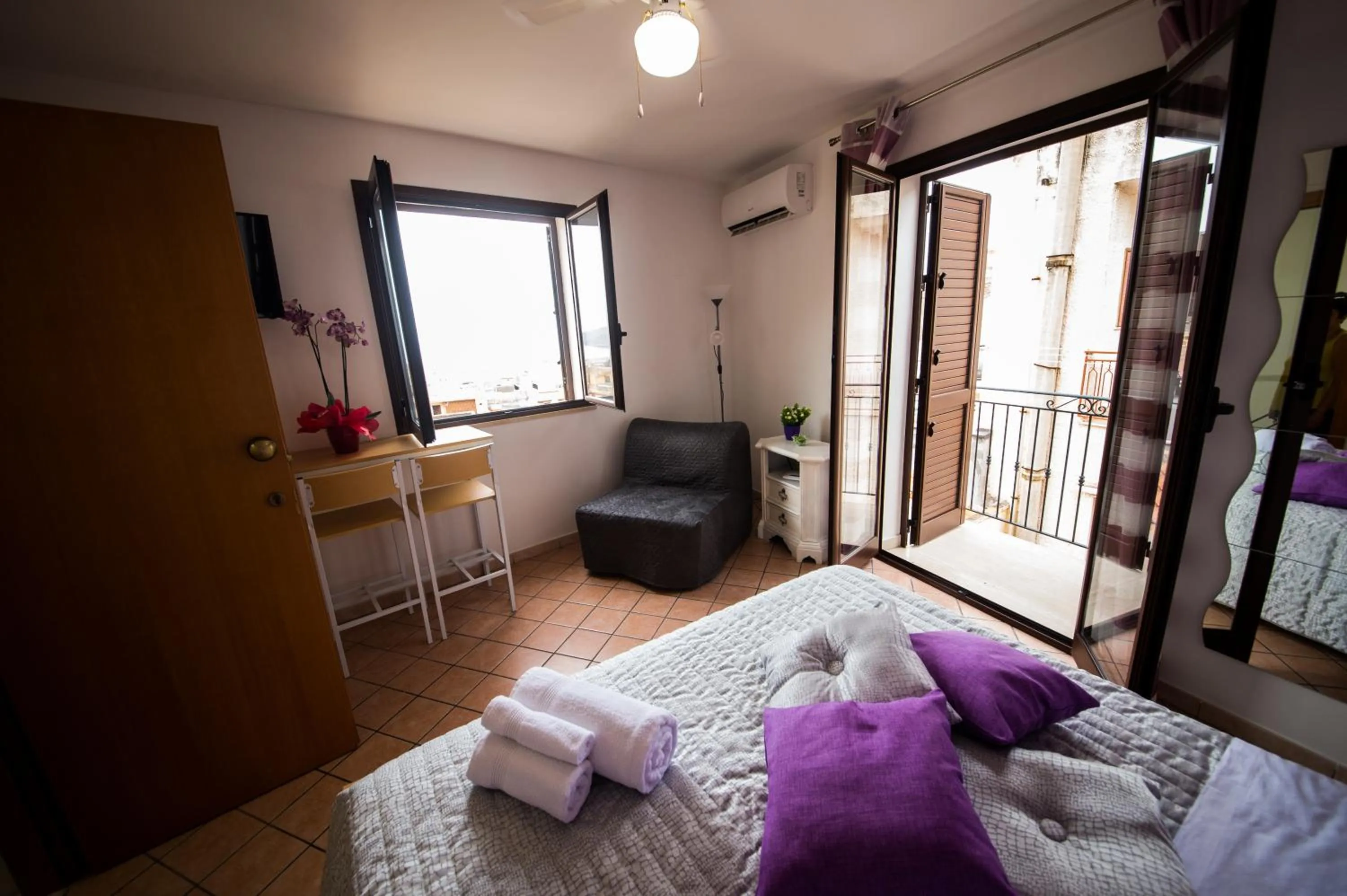 Bed in 'A Cumerdia - Casa Vacanze