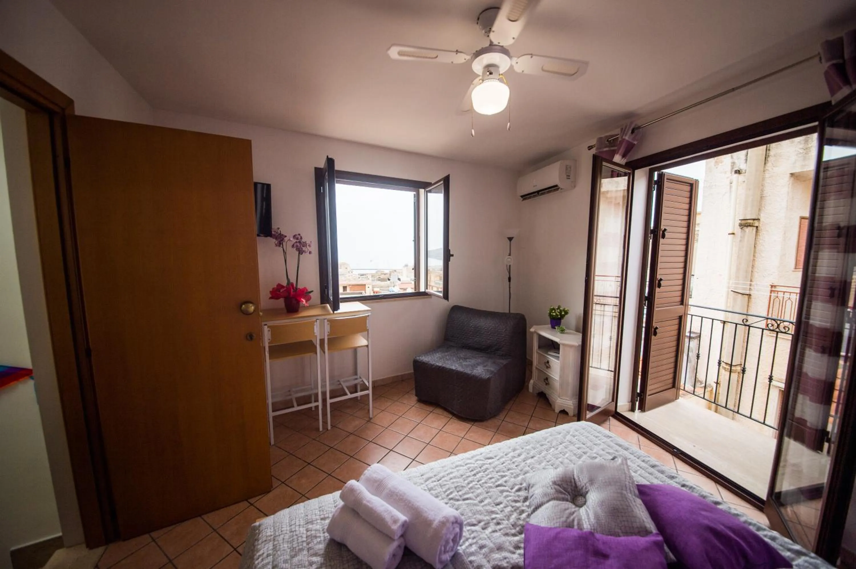 Bed in 'A Cumerdia - Casa Vacanze