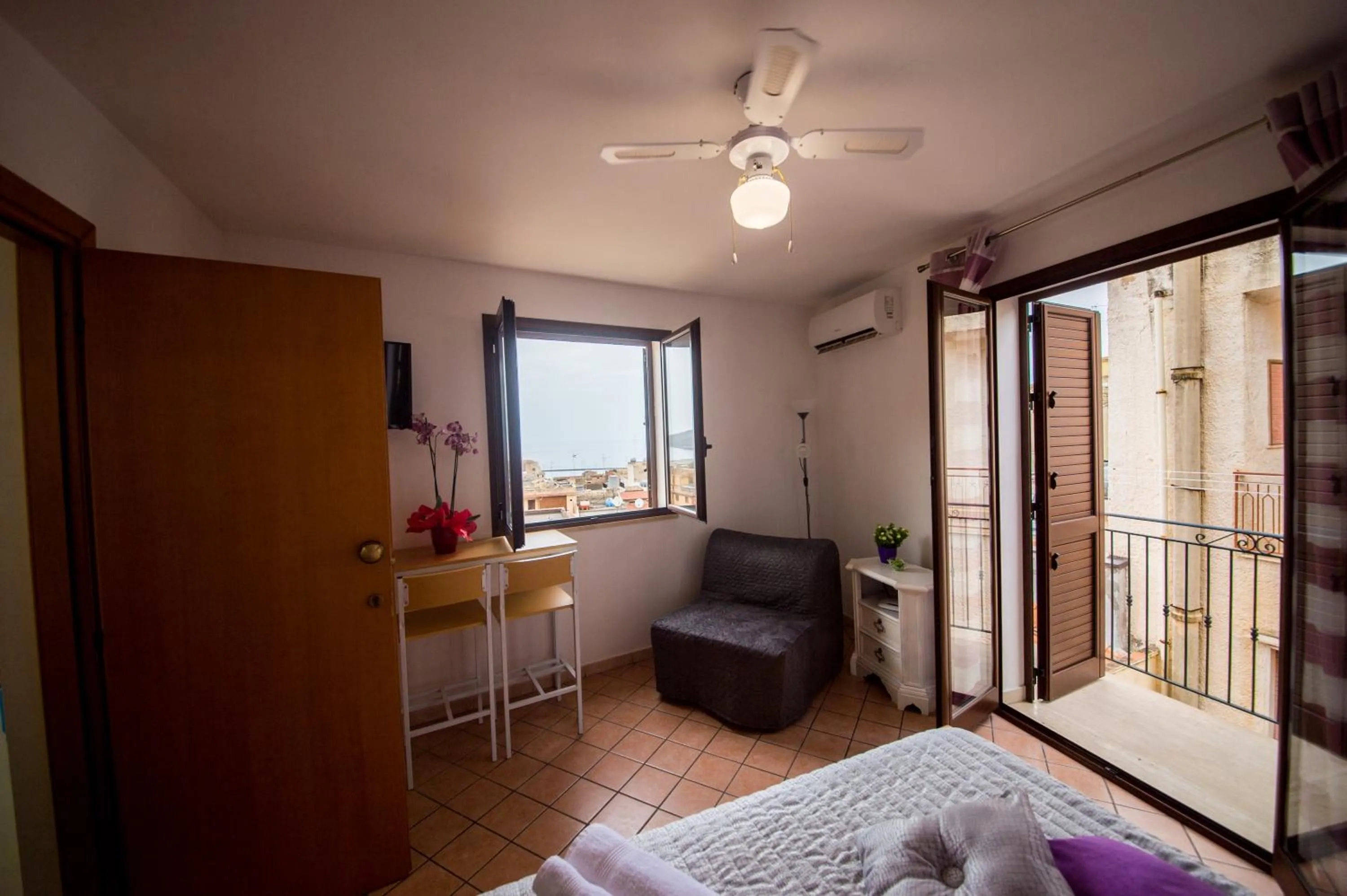 Bed in 'A Cumerdia - Casa Vacanze