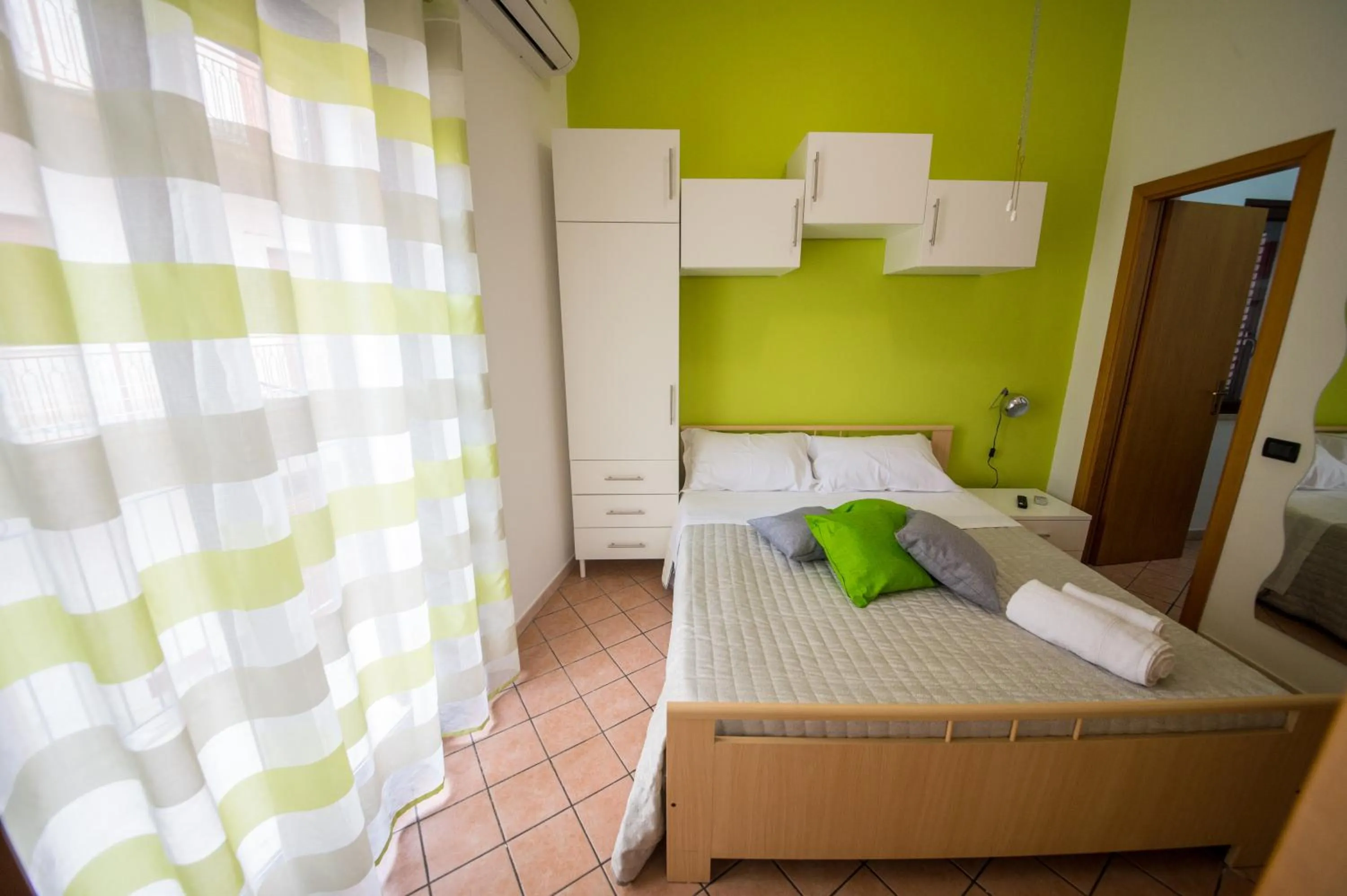 Bed in 'A Cumerdia - Casa Vacanze