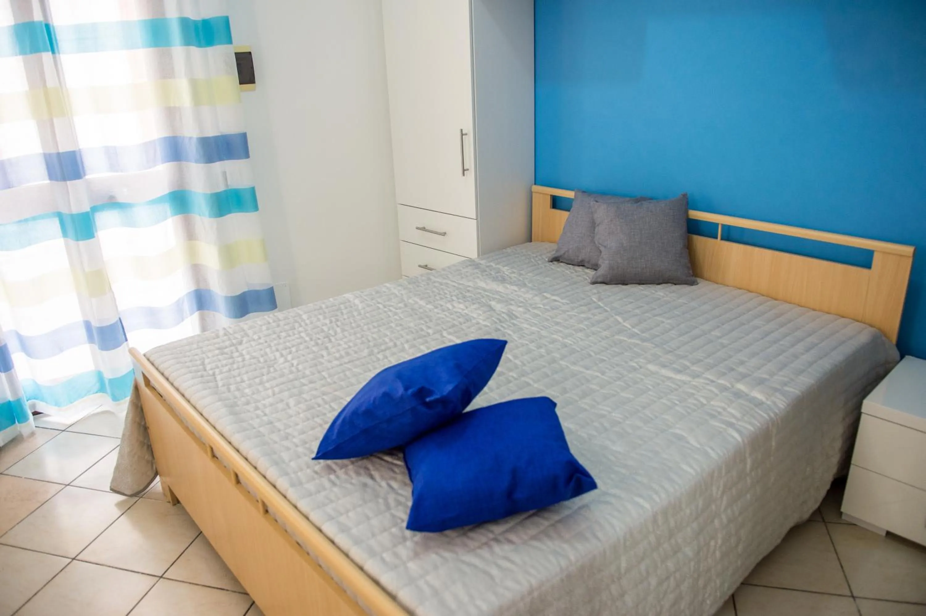 Bed in 'A Cumerdia - Casa Vacanze