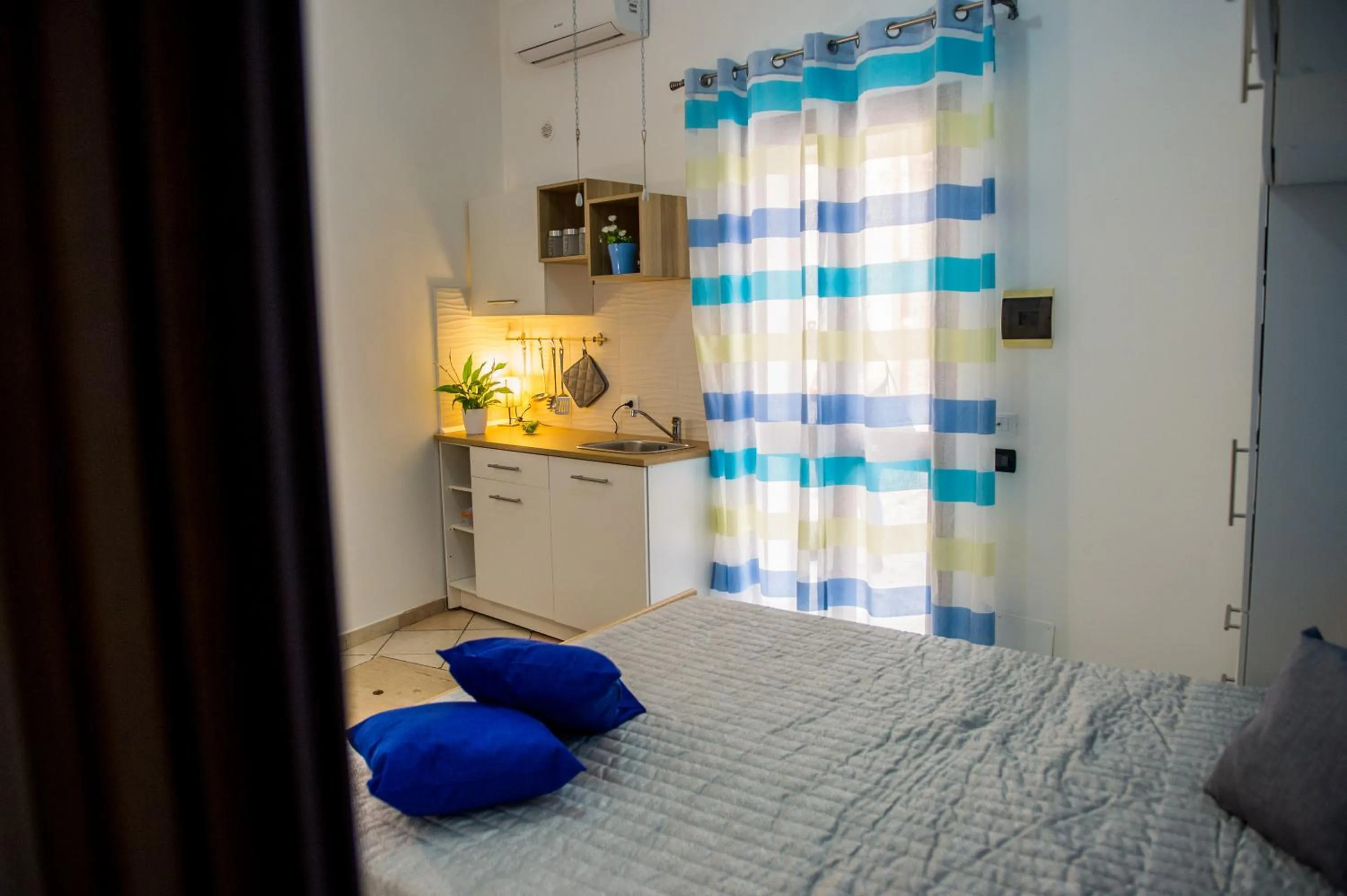 Bed in 'A Cumerdia - Casa Vacanze