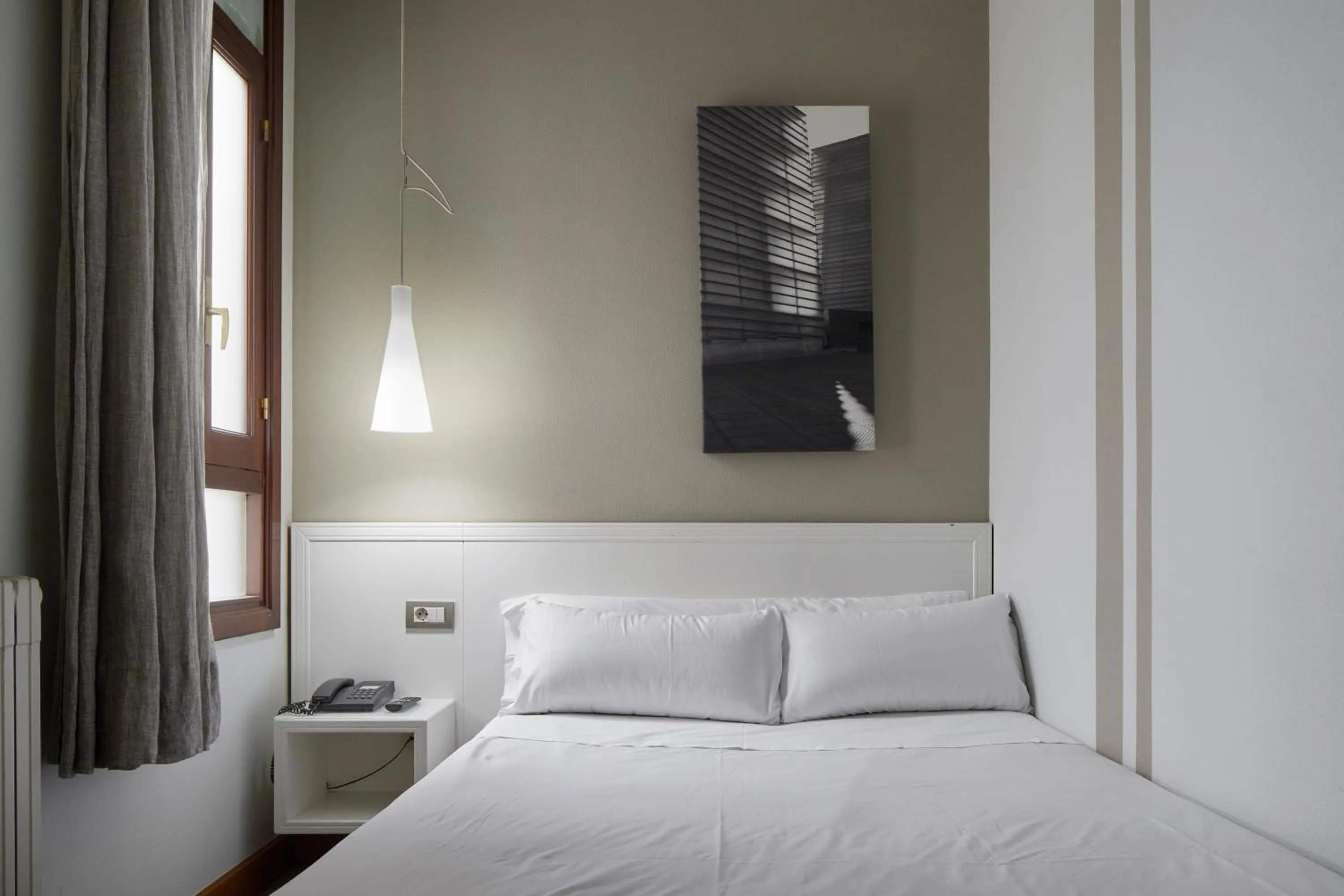 Bed in Pensión Alemana
