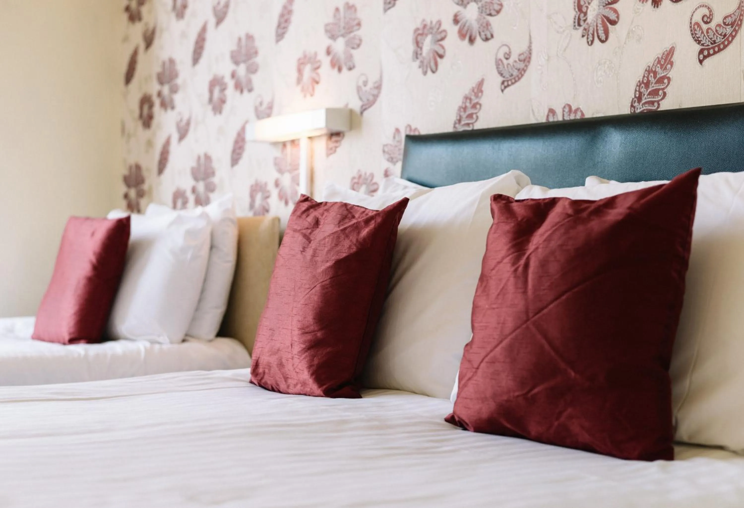 Bed in Four Oaks Hotel