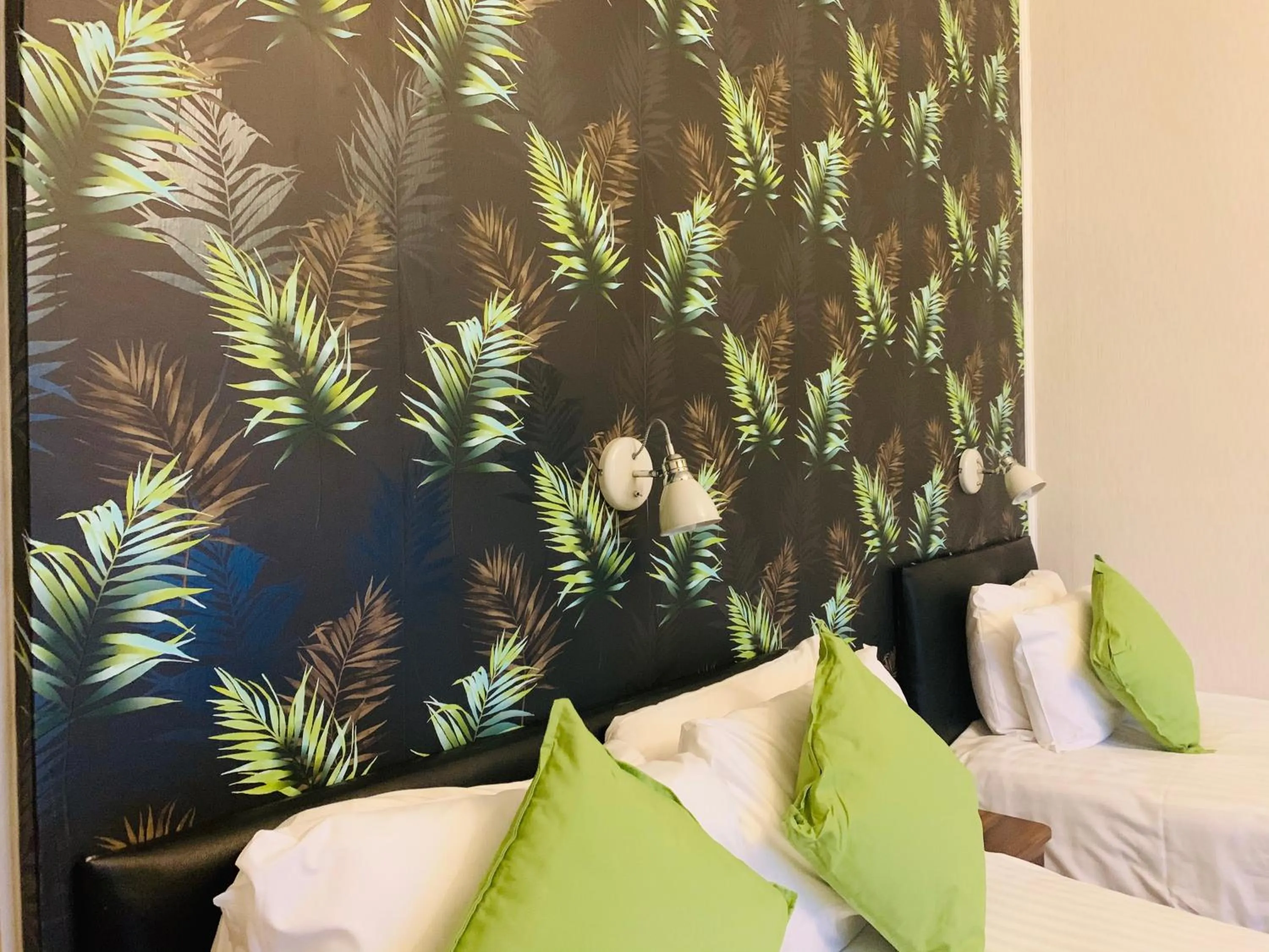 Bed in Four Oaks Hotel