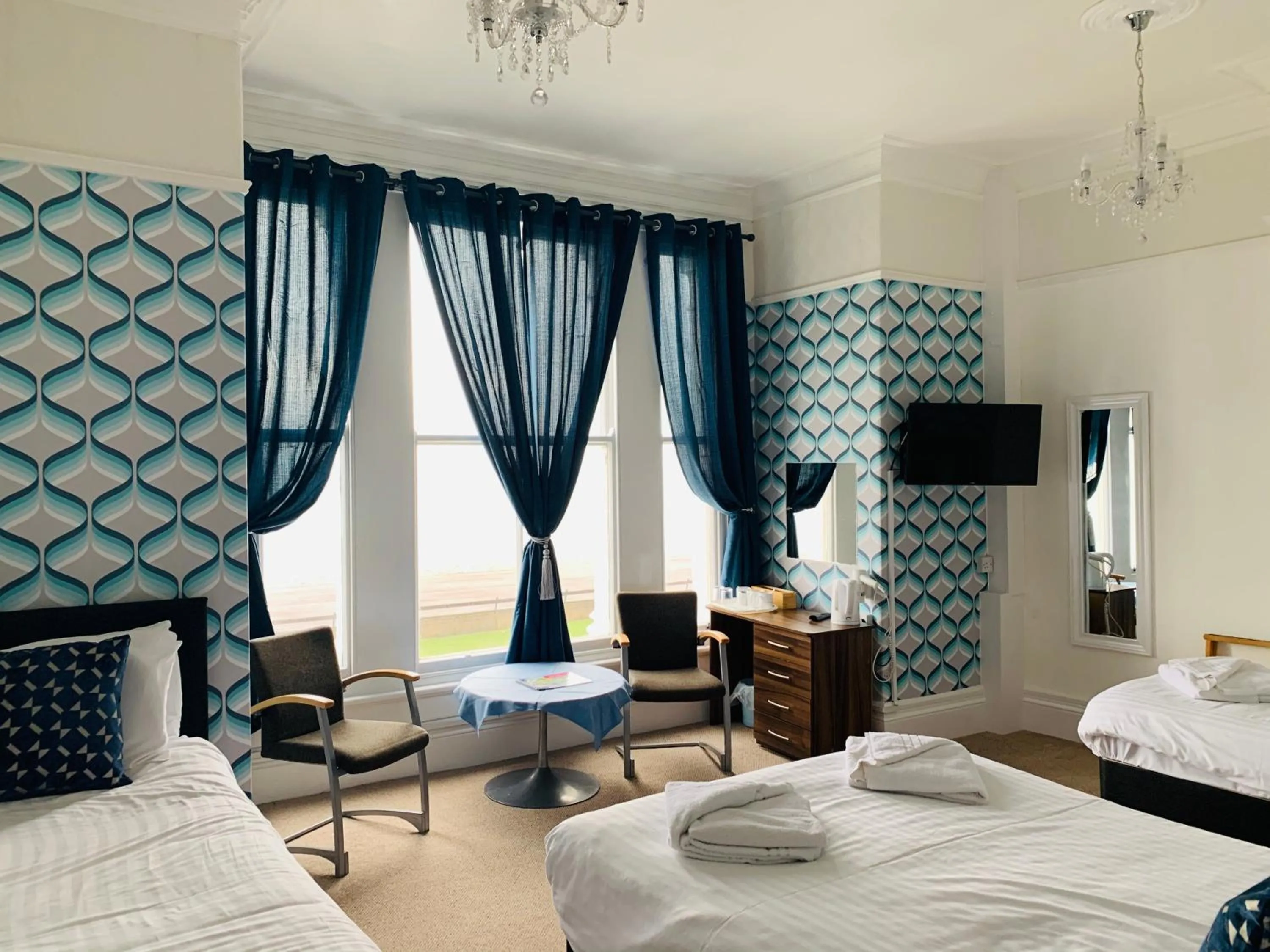 Bed in Four Oaks Hotel