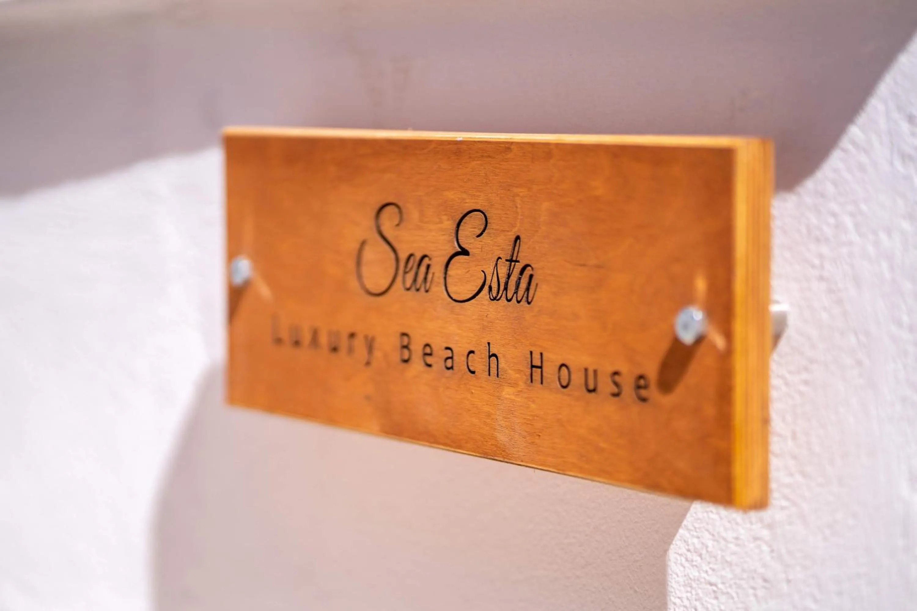 Logo/Certificate/Sign in Beach Houses Santorini