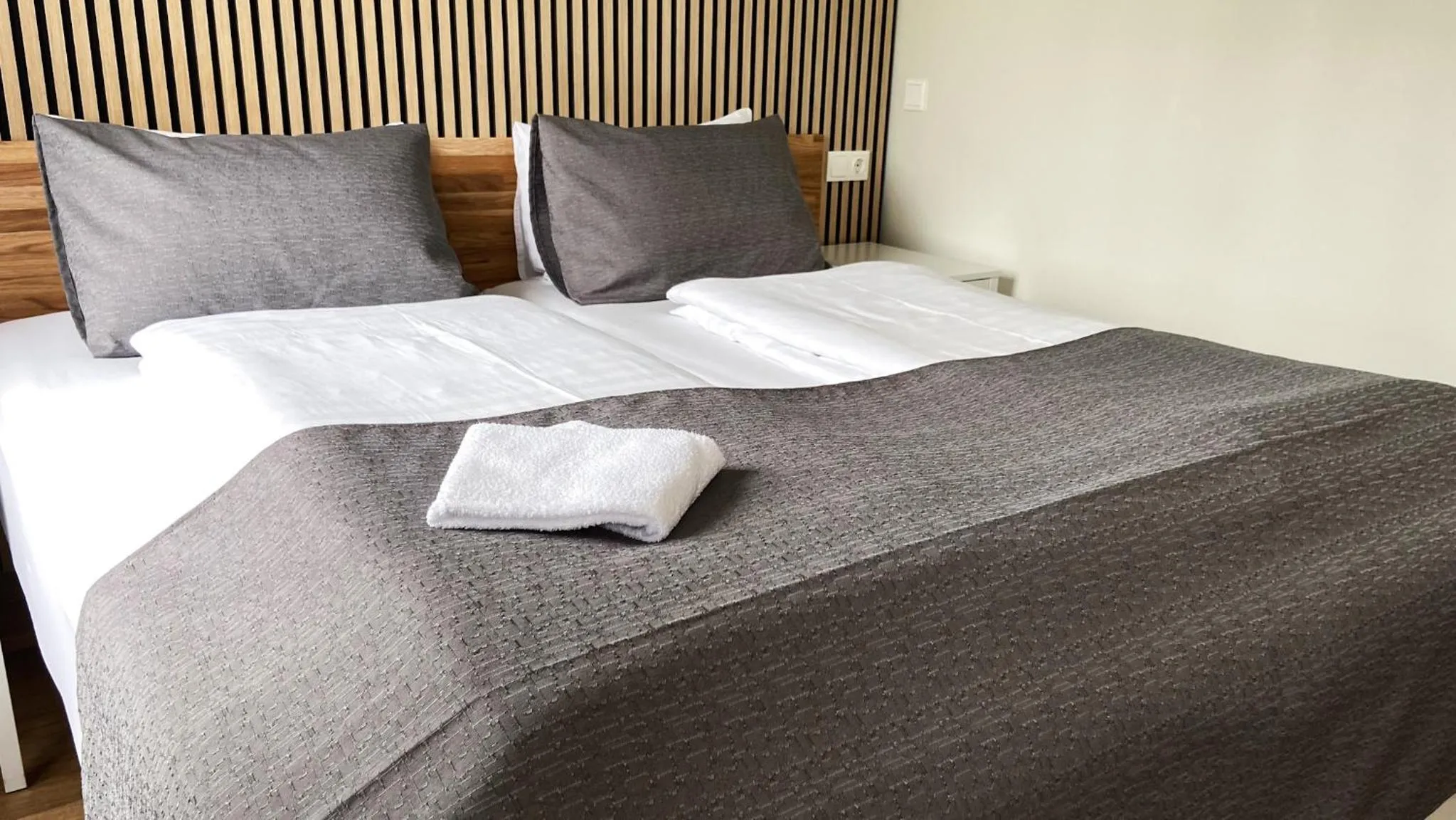 Bed in Skipalaekur Guesthouse