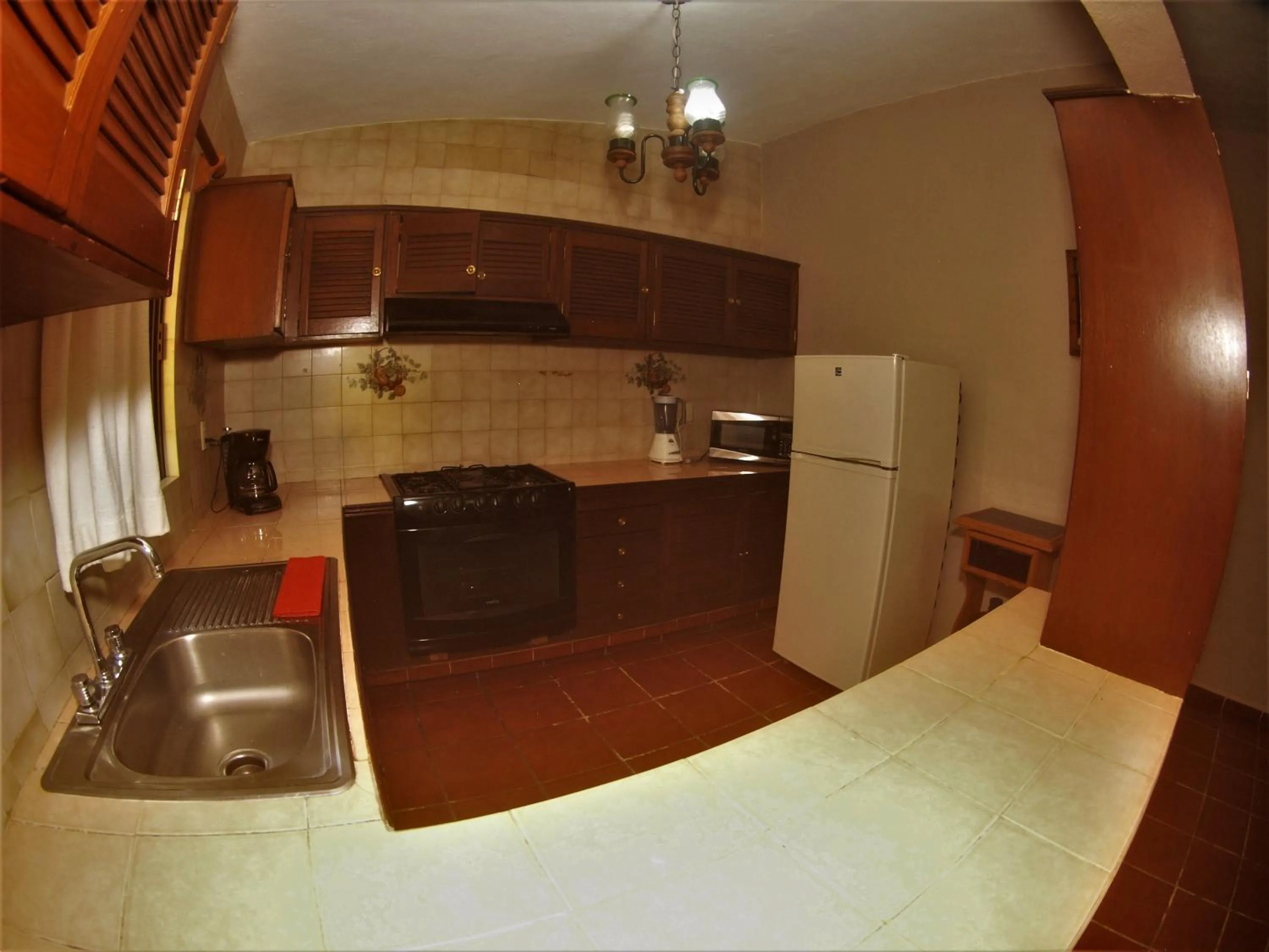 Kitchen or kitchenette in Quinta Comala Hotel & Villas