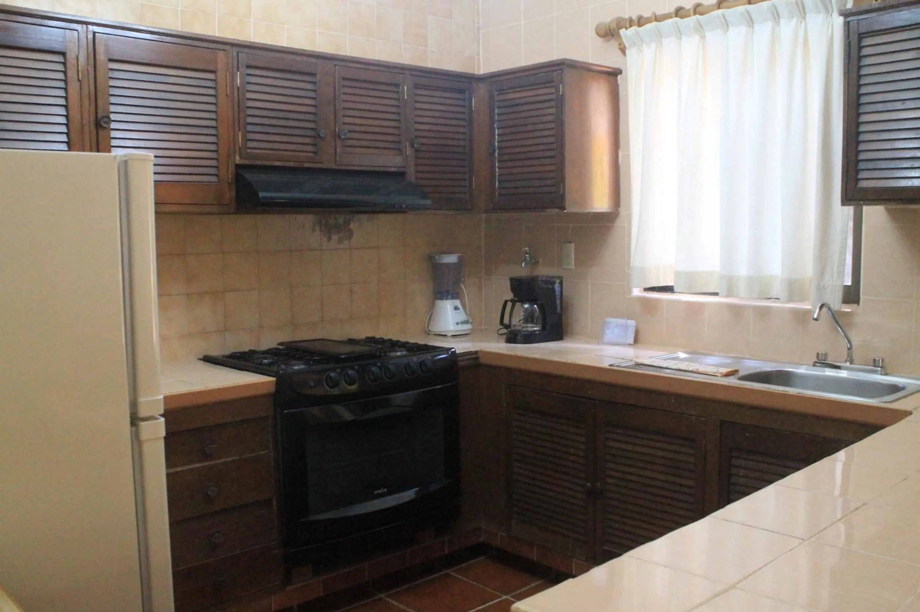 Kitchen or kitchenette in Quinta Comala Hotel & Villas