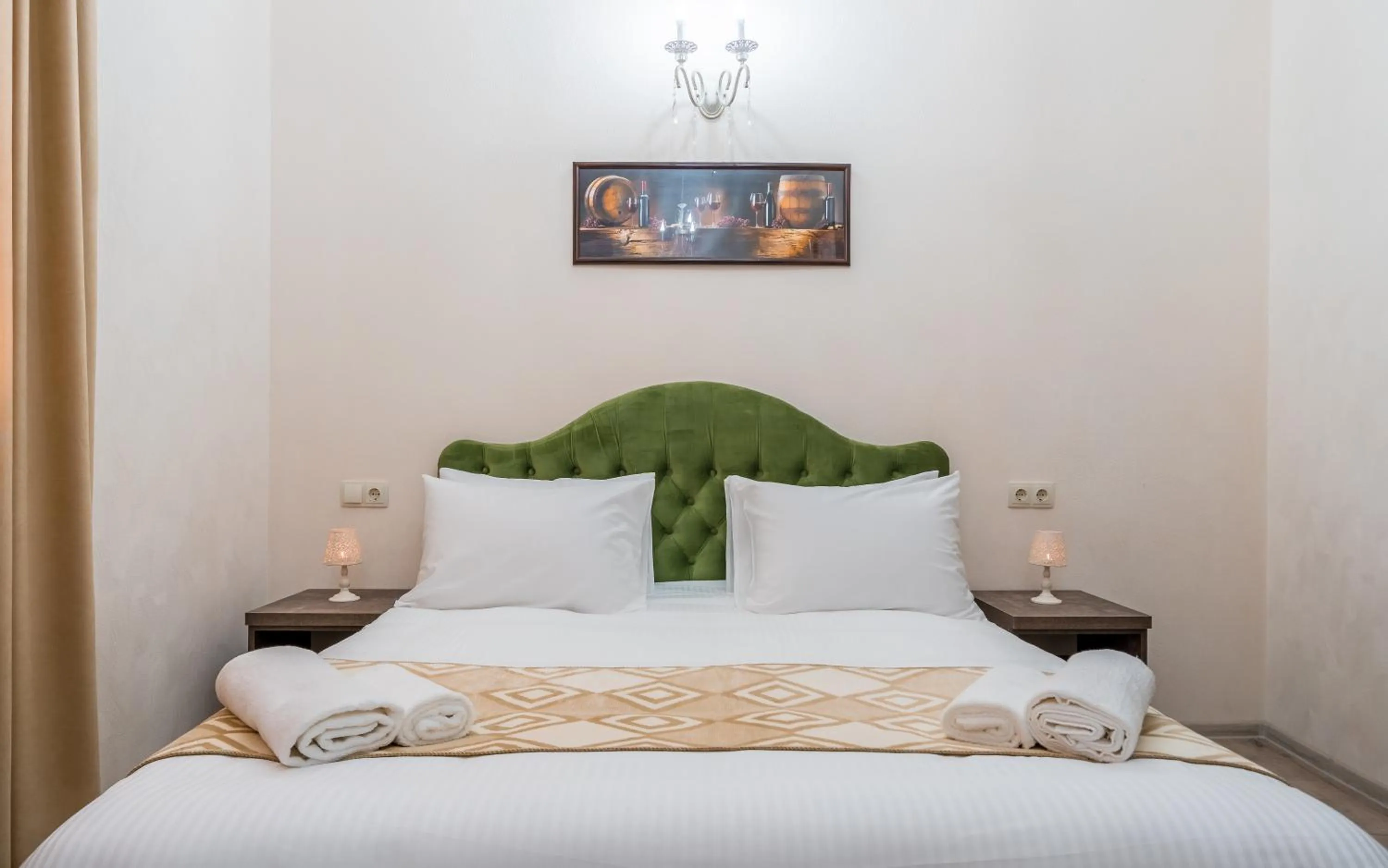 Bed in Golden Light Hotel