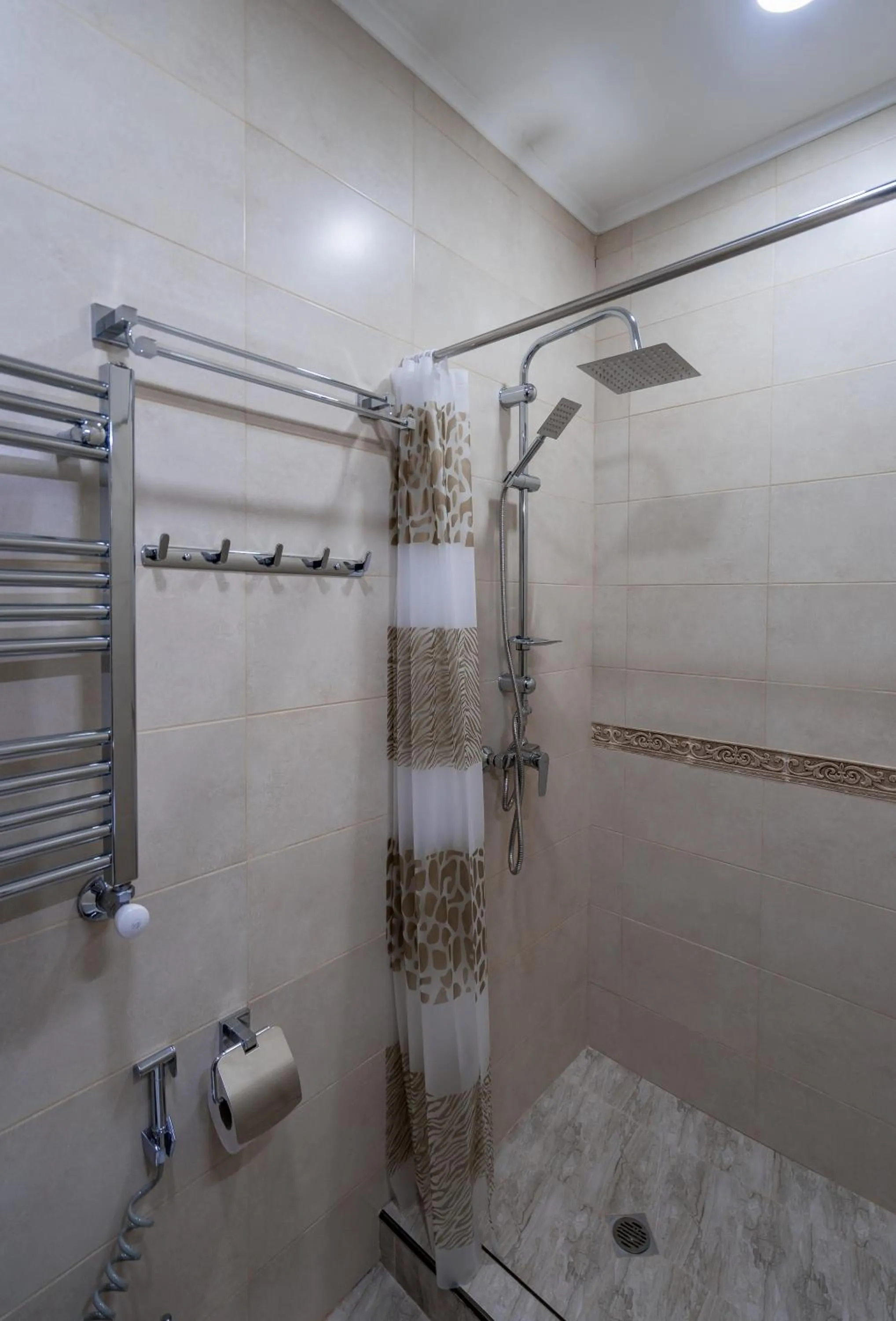 Shower in Golden Light Hotel