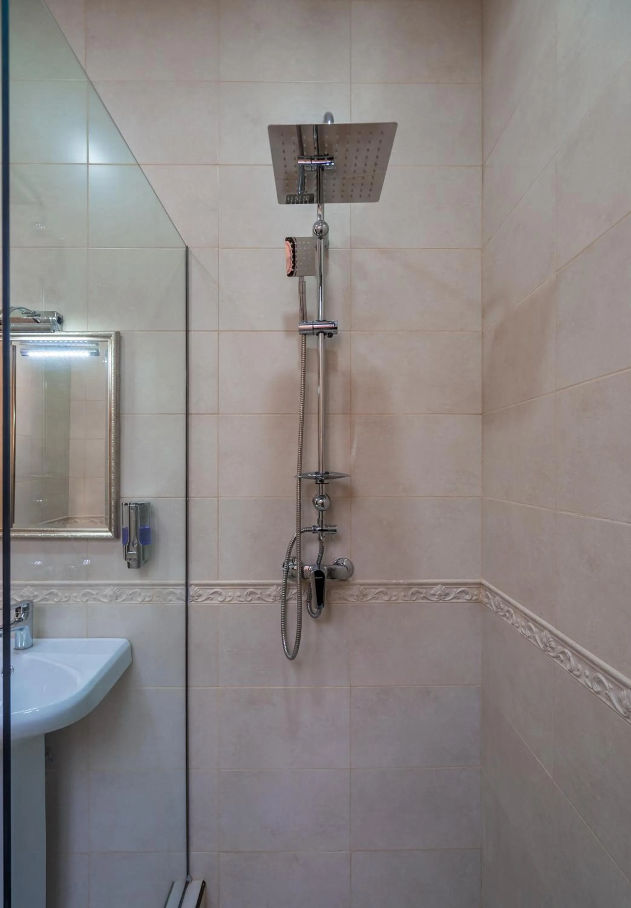 Shower in Golden Light Hotel