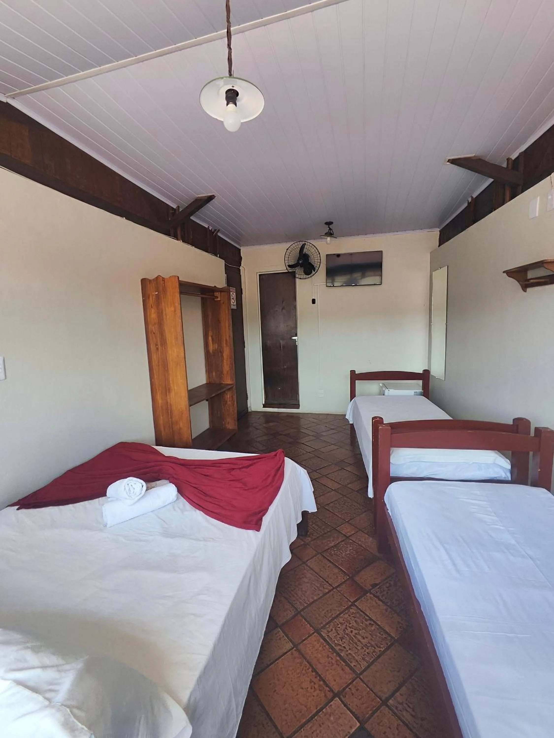 Bed in Pousada Acayaca