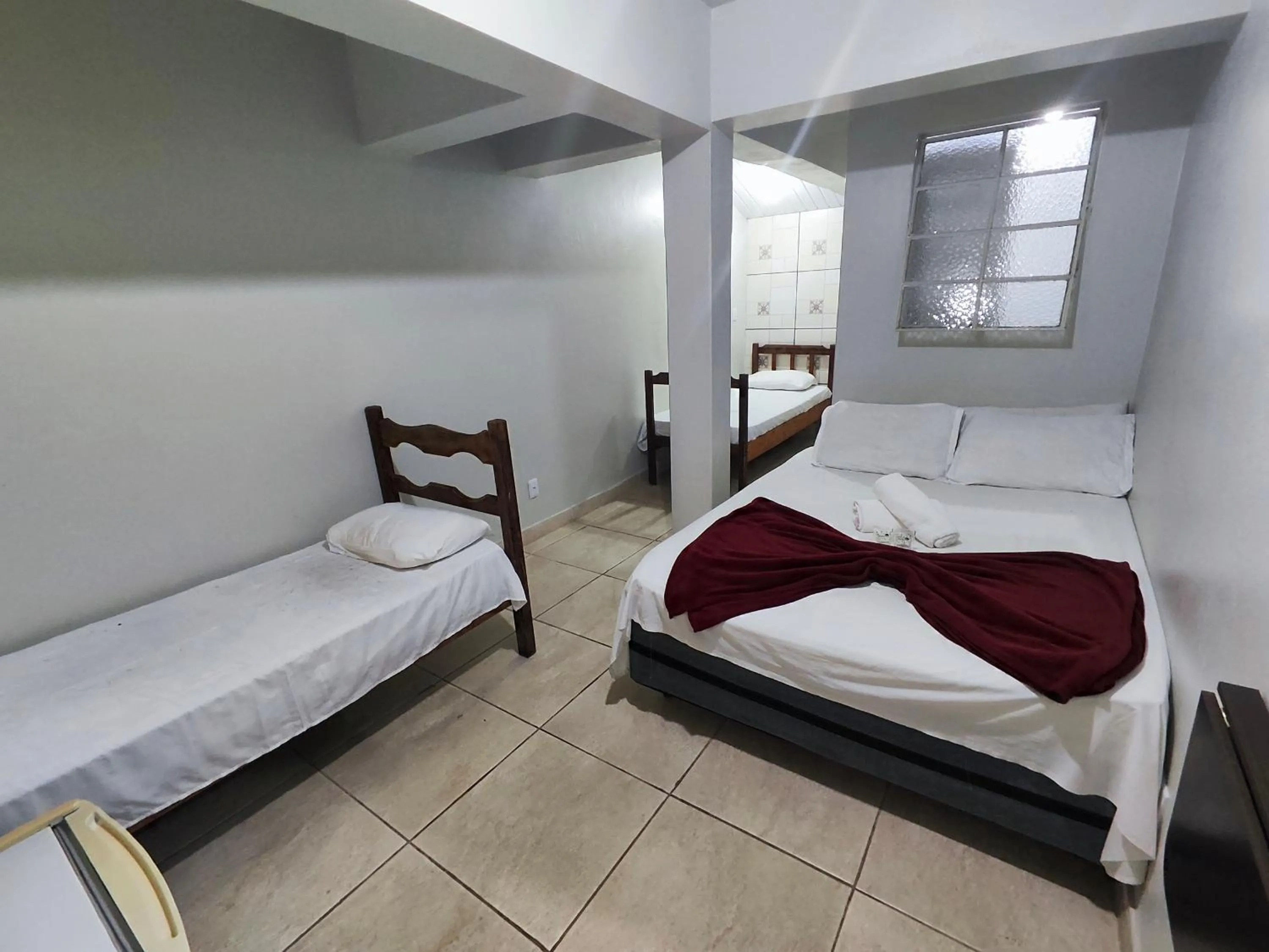 Bed in Pousada Acayaca