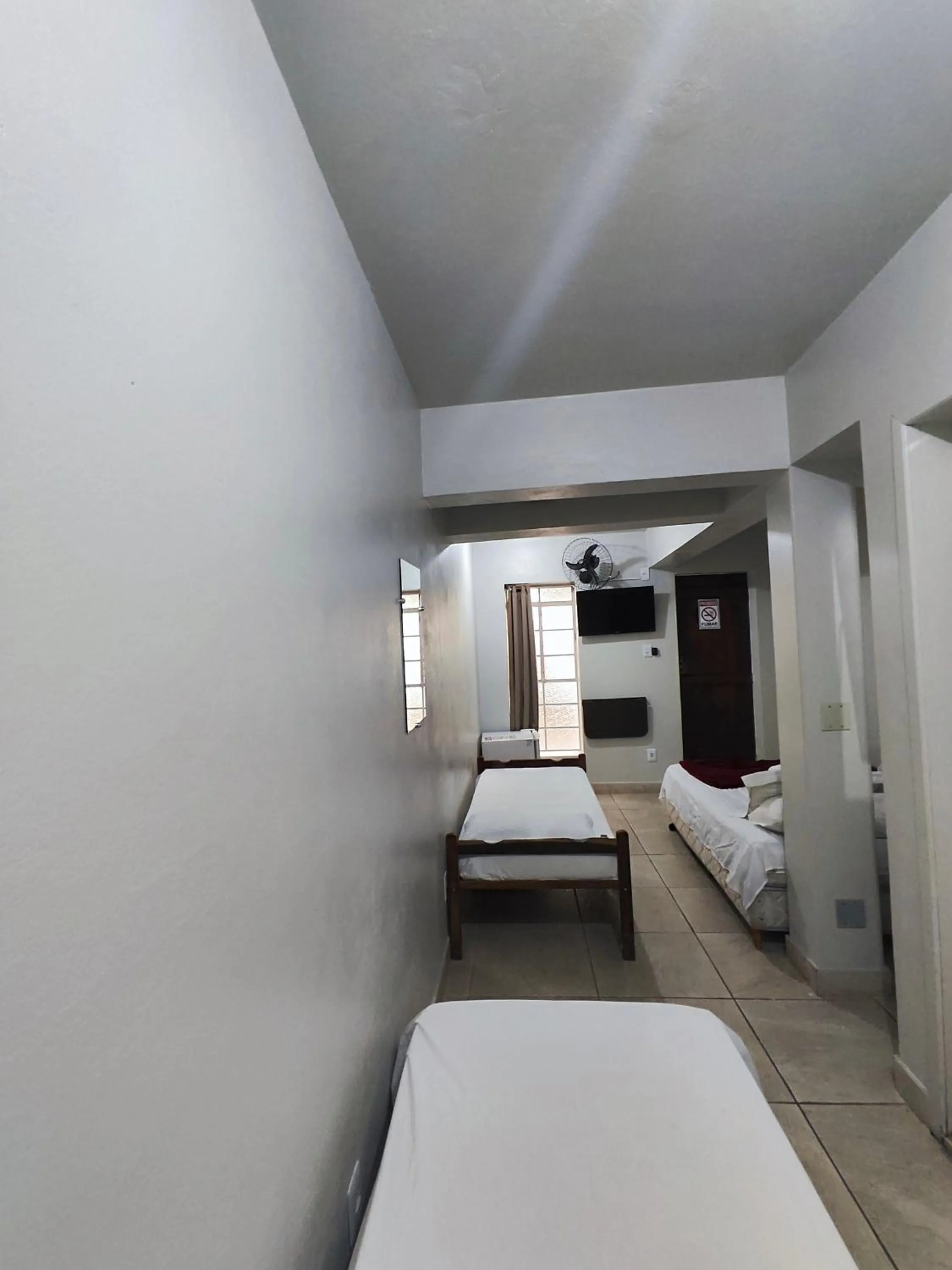 Bed in Pousada Acayaca