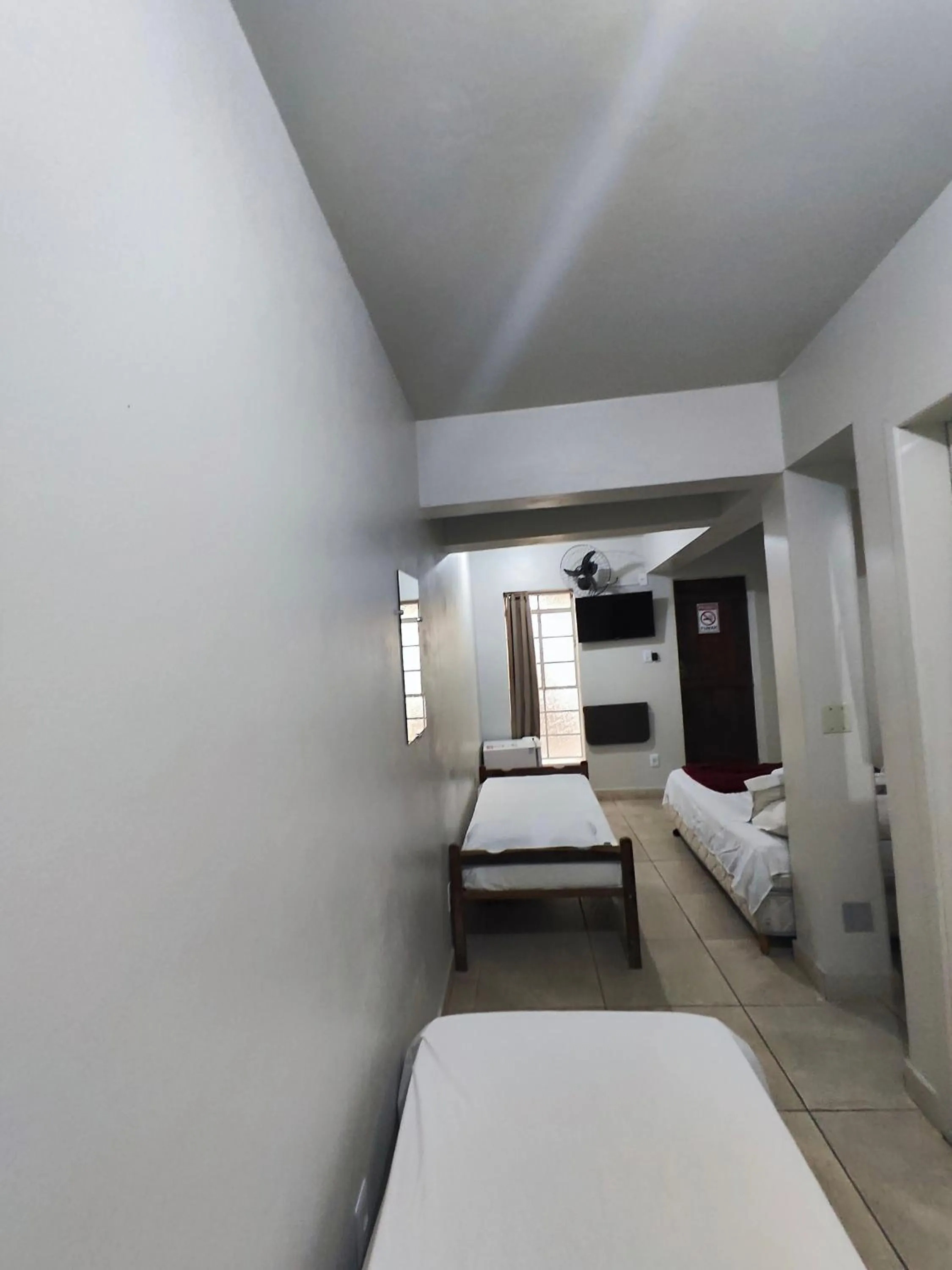 Bed in Pousada Acayaca